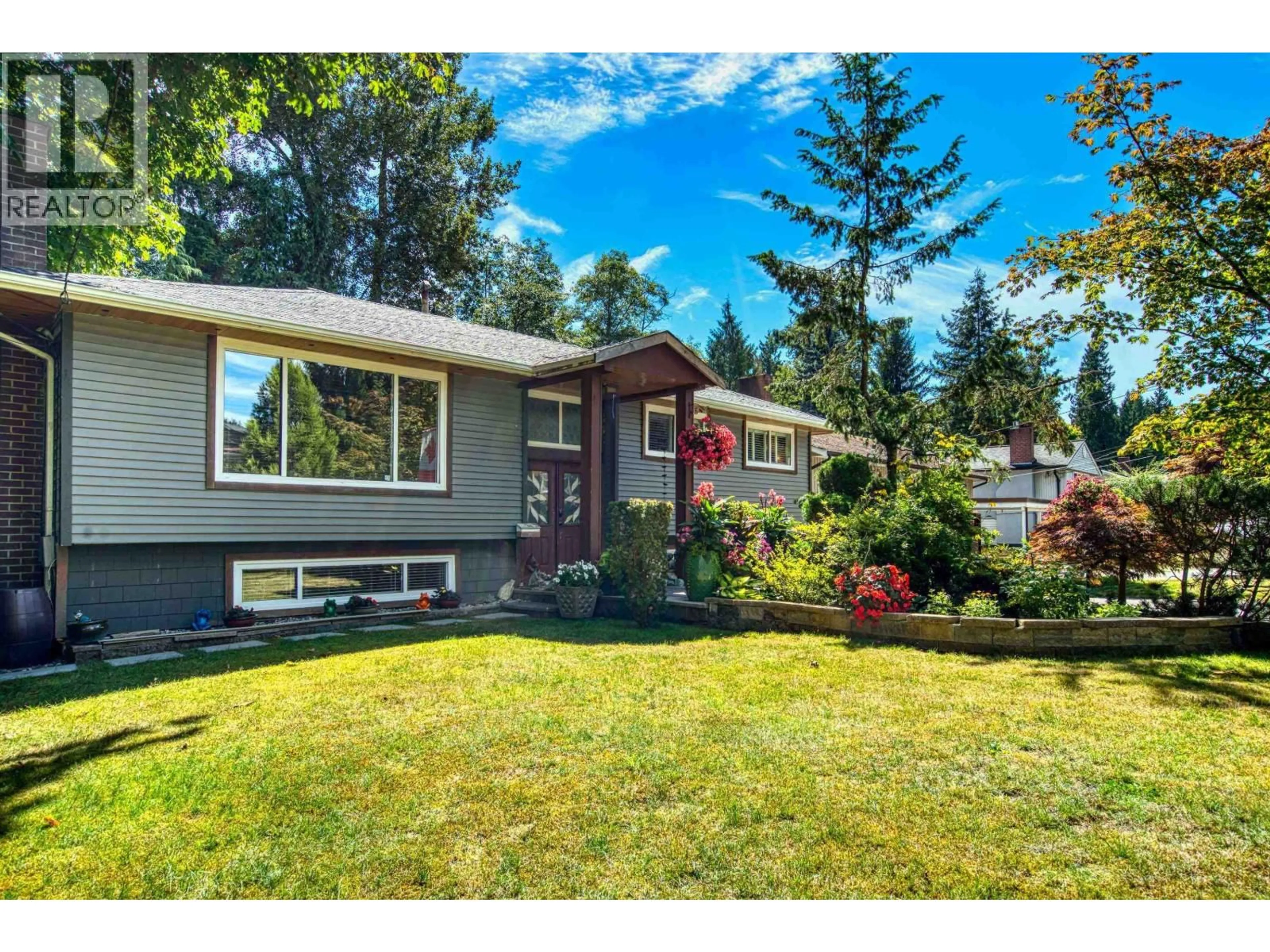 Home with vinyl exterior material, street for 517 AILSA AVENUE, Port Moody British Columbia V3H1A5