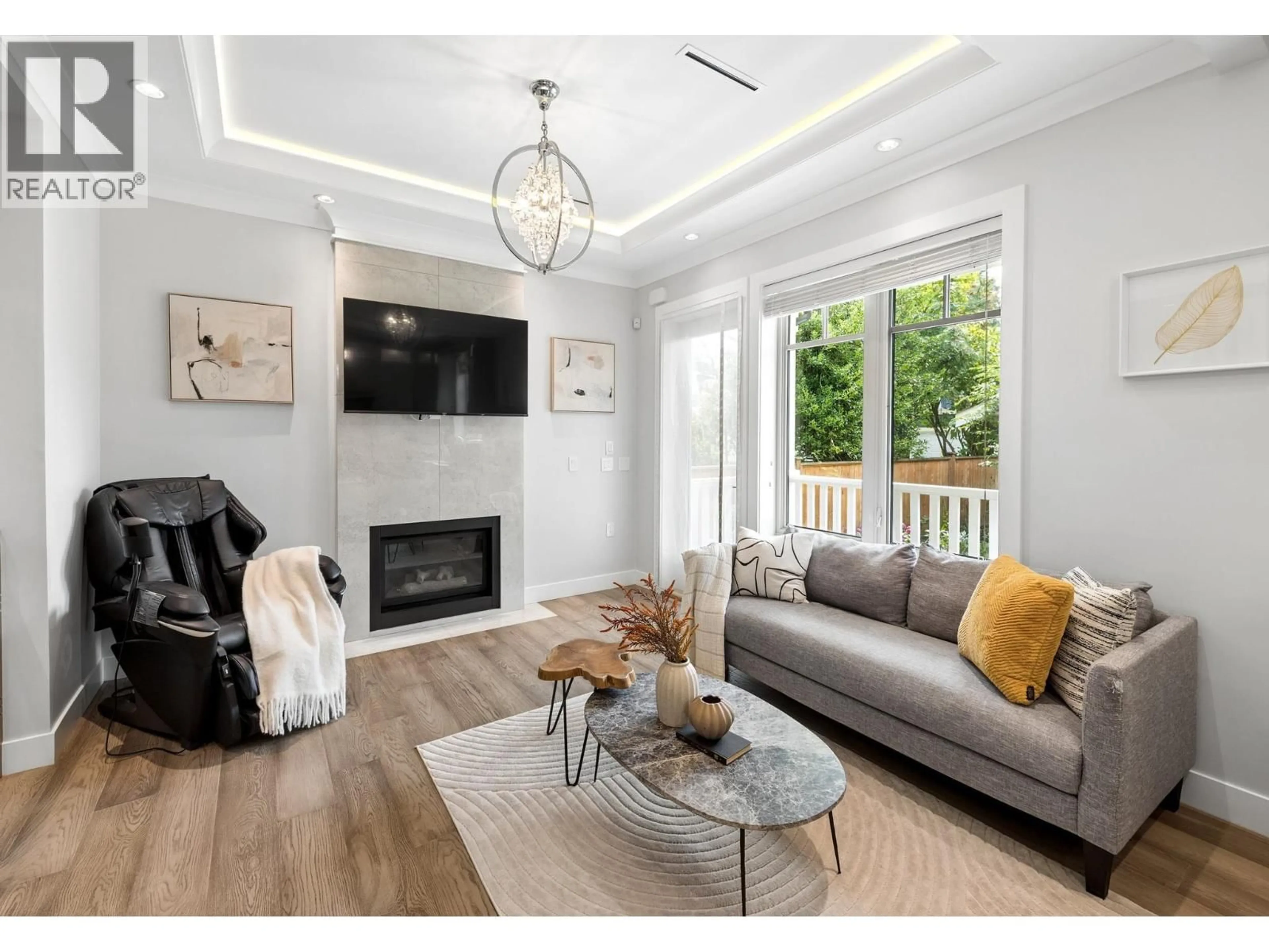 Living room with furniture, wood/laminate floor for 3666 6TH AVENUE, Vancouver British Columbia V6R1T7