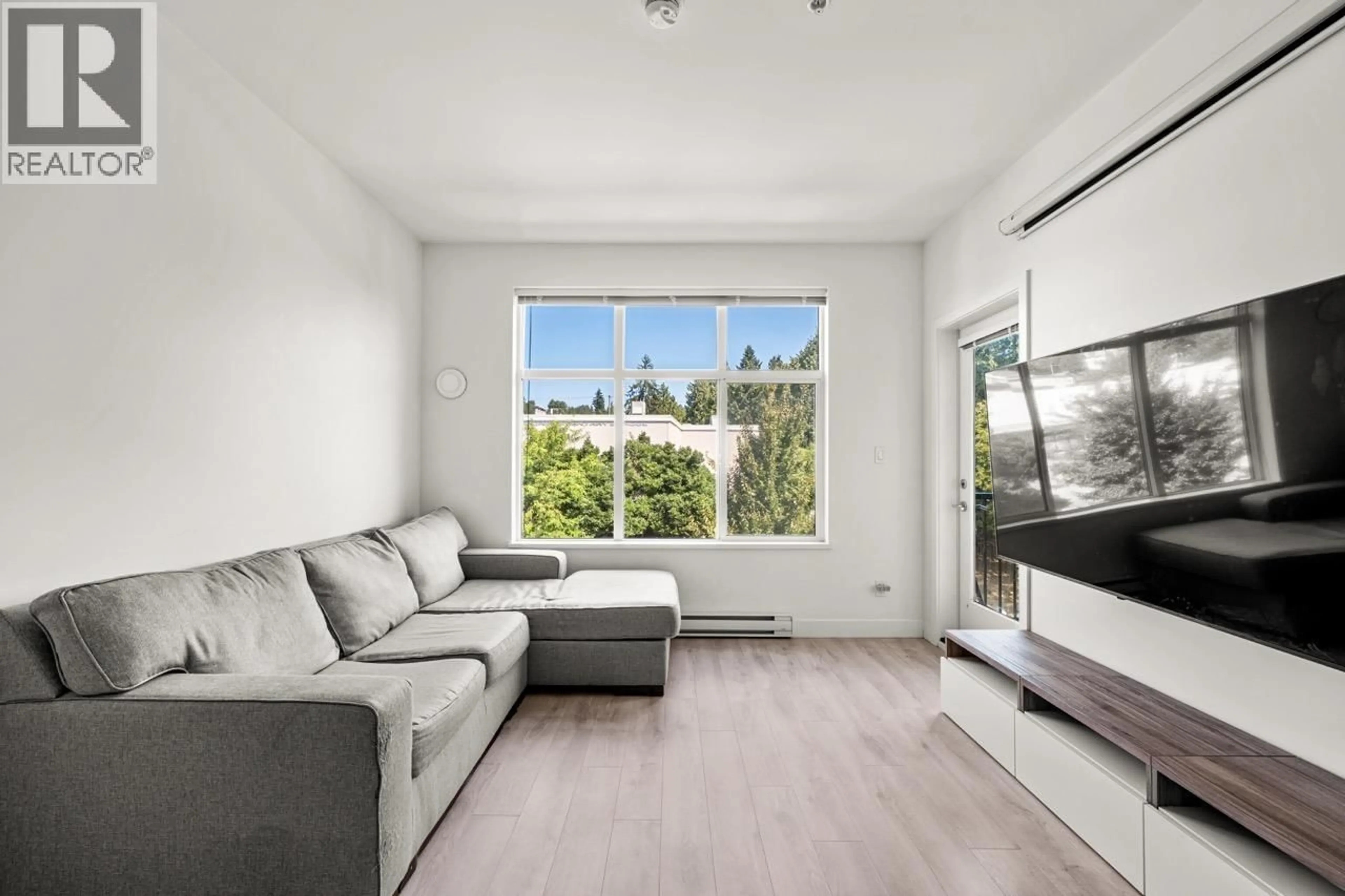 Living room with furniture, unknown for 312 - 828 GAUTHIER AVENUE, Coquitlam British Columbia V3K0E9