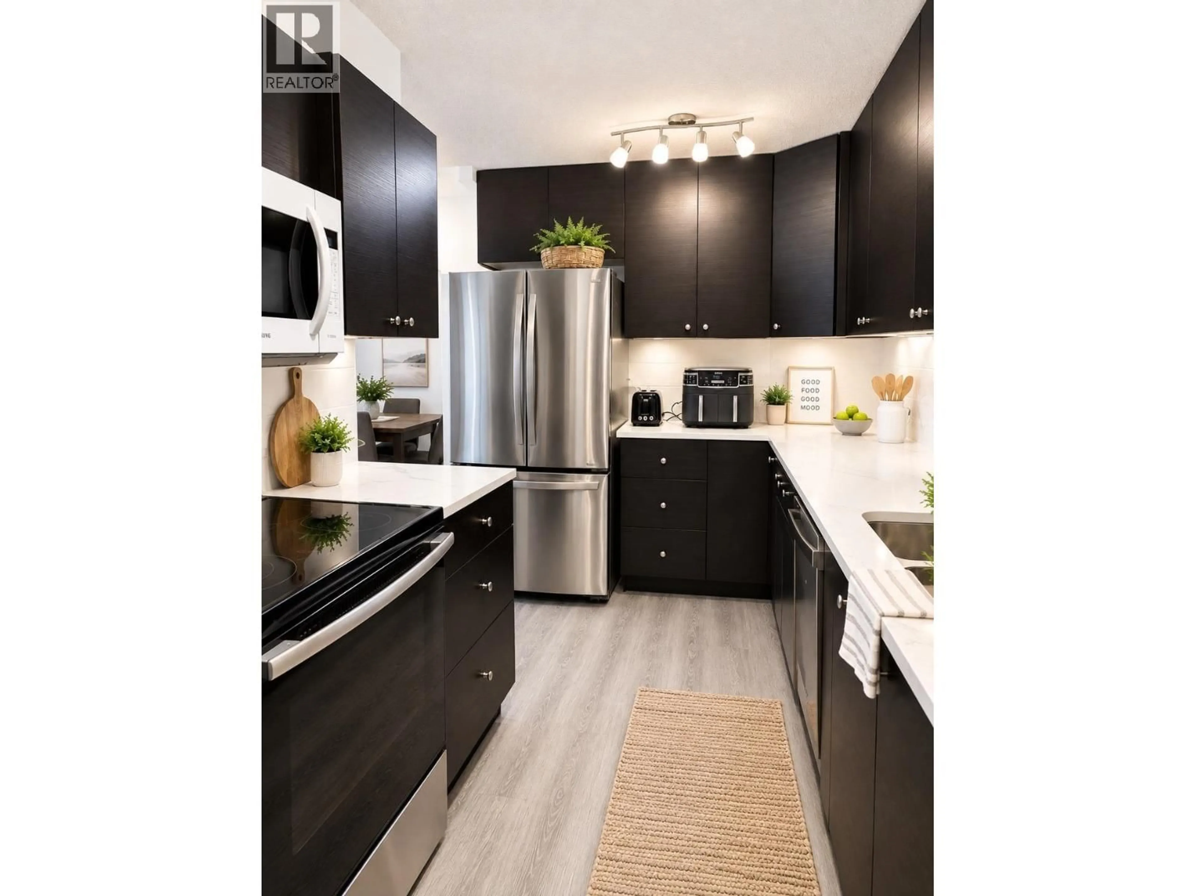 Contemporary kitchen, wood/laminate floor for 905 - 2016 FULLERTON AVENUE, North Vancouver British Columbia V7P3E6