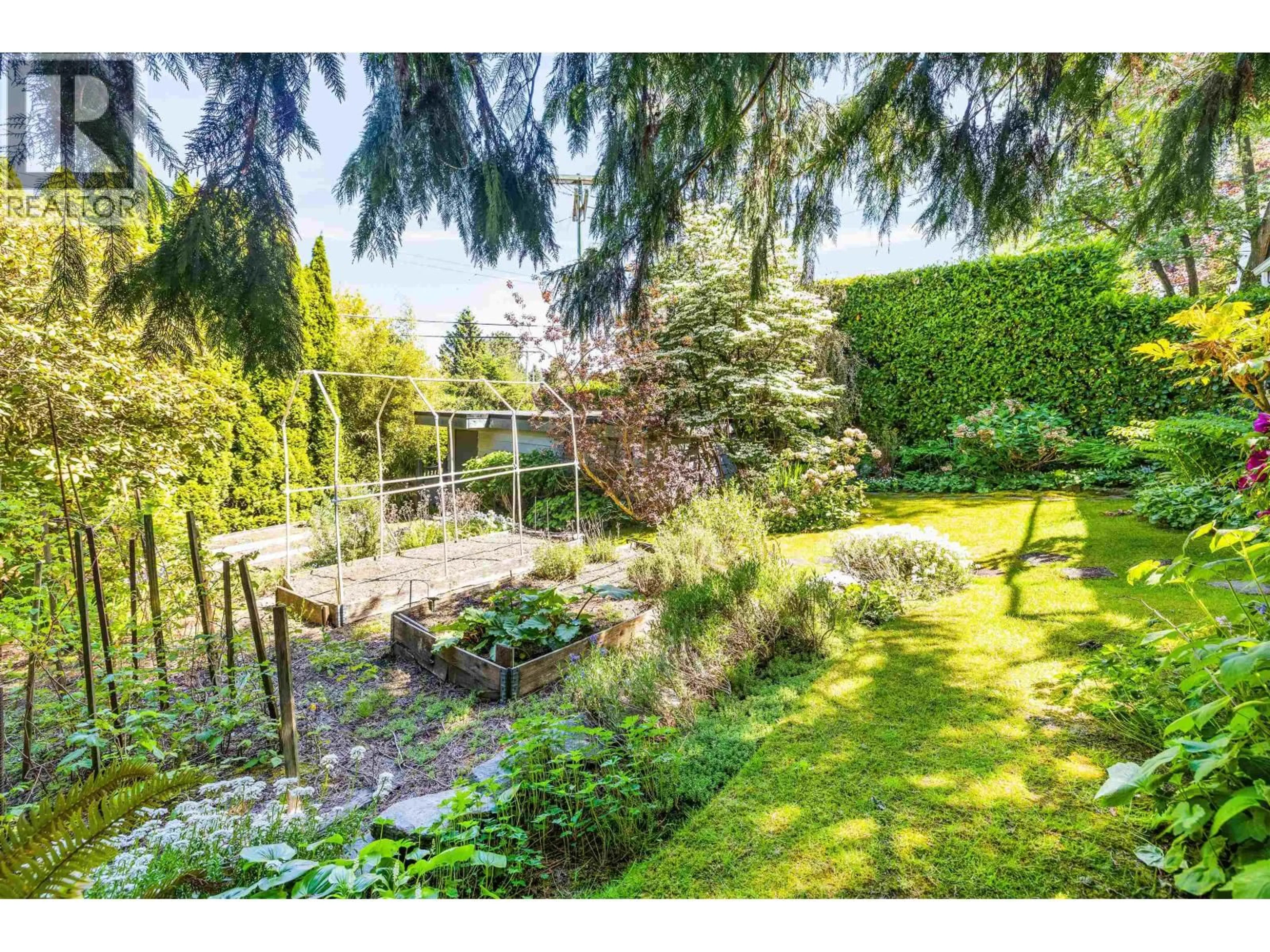 A pic from outside/outdoor area/front of a property/back of a property/a pic from drone, forest/trees view for 4888 NARVAEZ DRIVE, Vancouver British Columbia V6L2J2