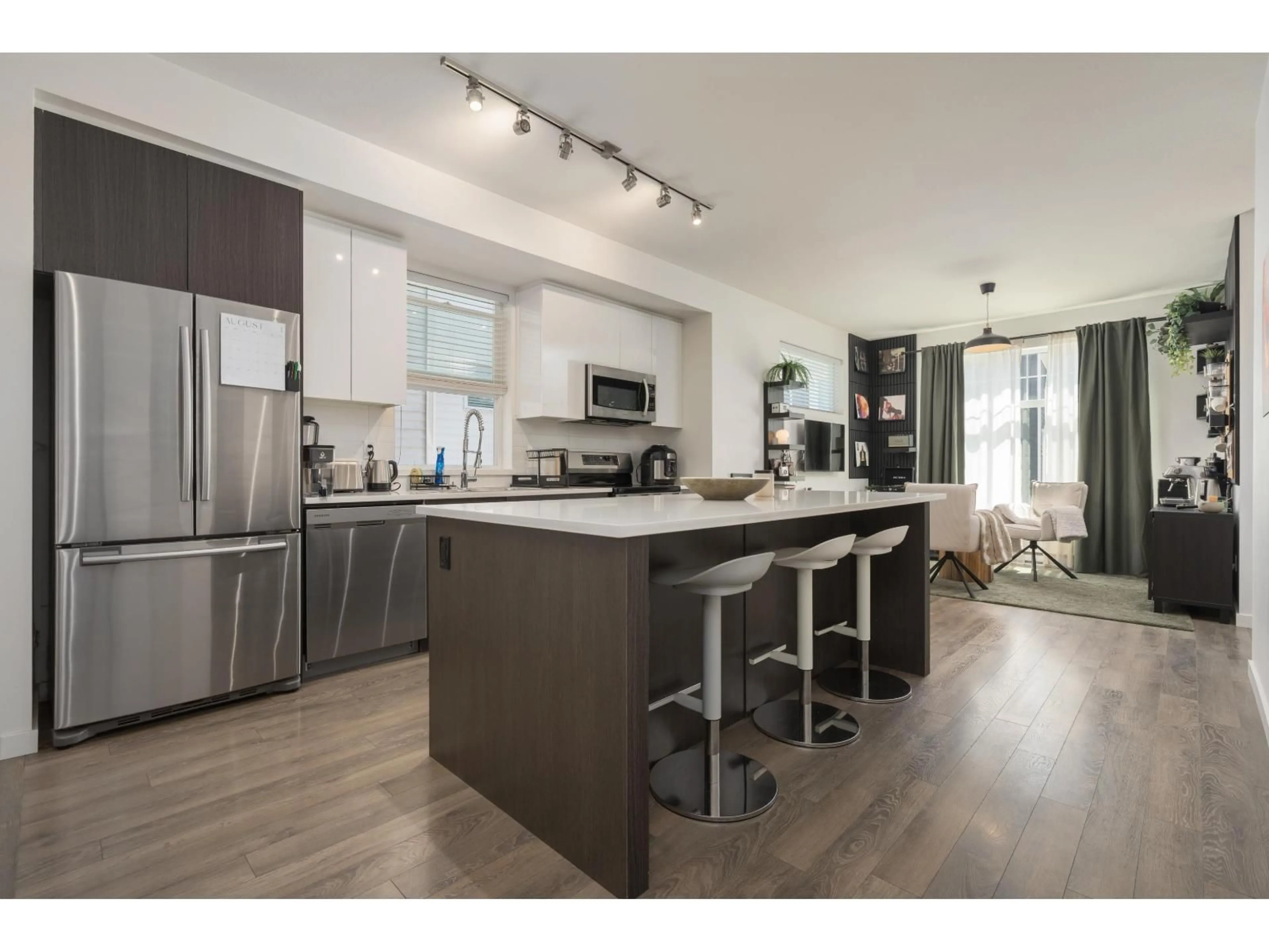 Open concept kitchen, wood/laminate floor for 44 - 18681 68 AVENUE, Surrey British Columbia V4N6P3