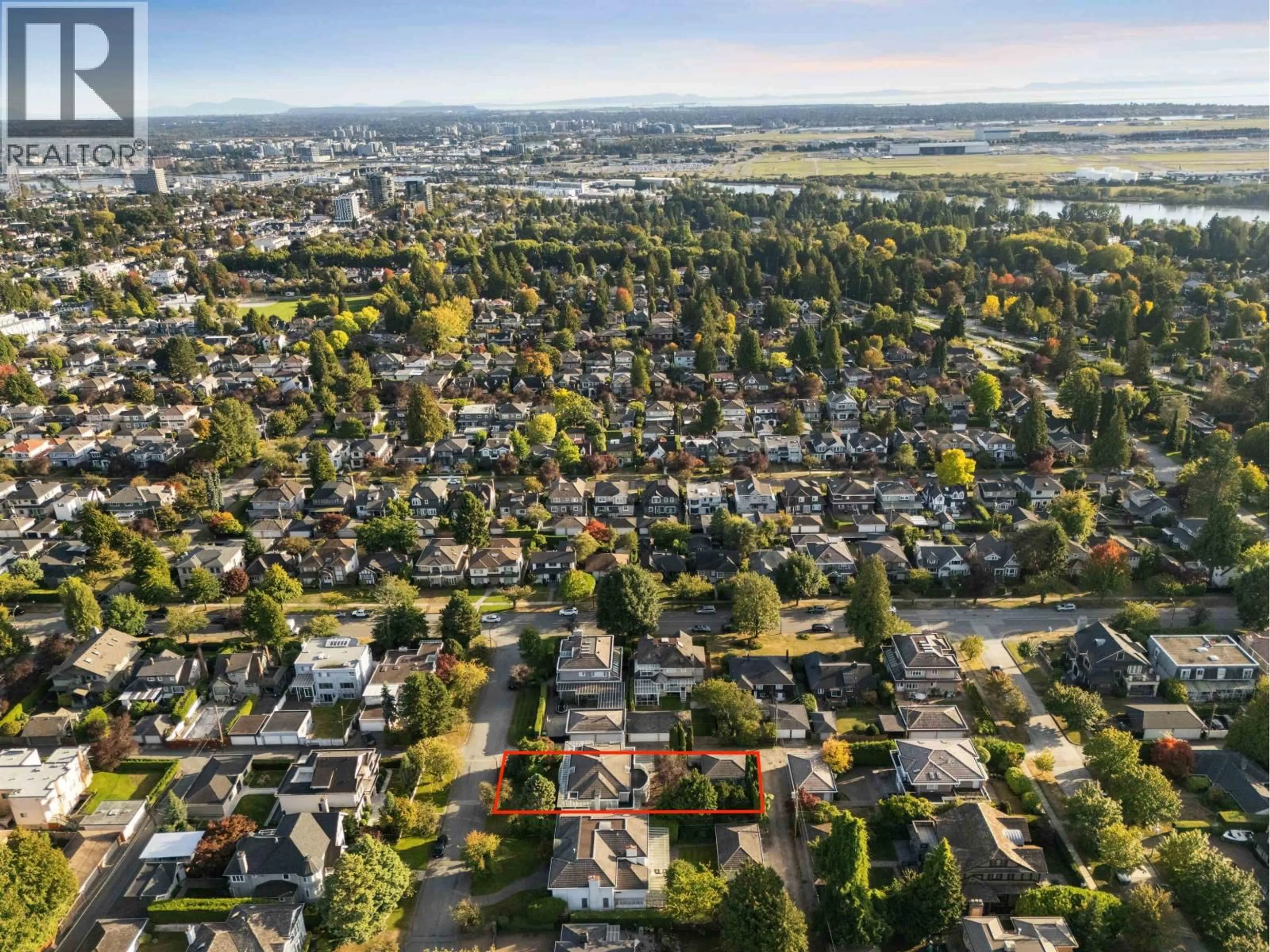 A pic from outside/outdoor area/front of a property/back of a property/a pic from drone, street for 7289 MARGUERITE STREET, Vancouver British Columbia V6P5G4