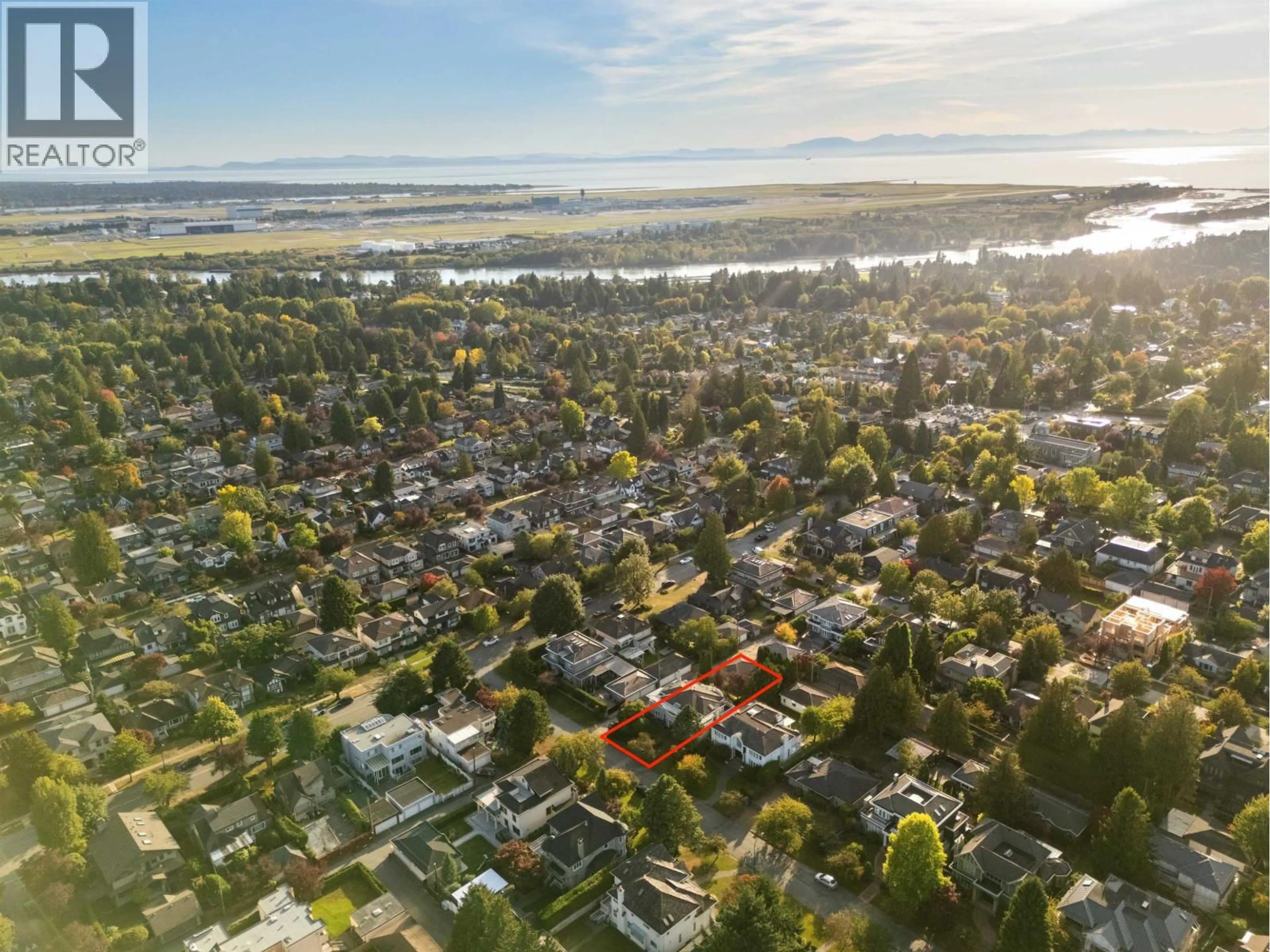 A pic from outside/outdoor area/front of a property/back of a property/a pic from drone, street for 7289 MARGUERITE STREET, Vancouver British Columbia V6P5G4
