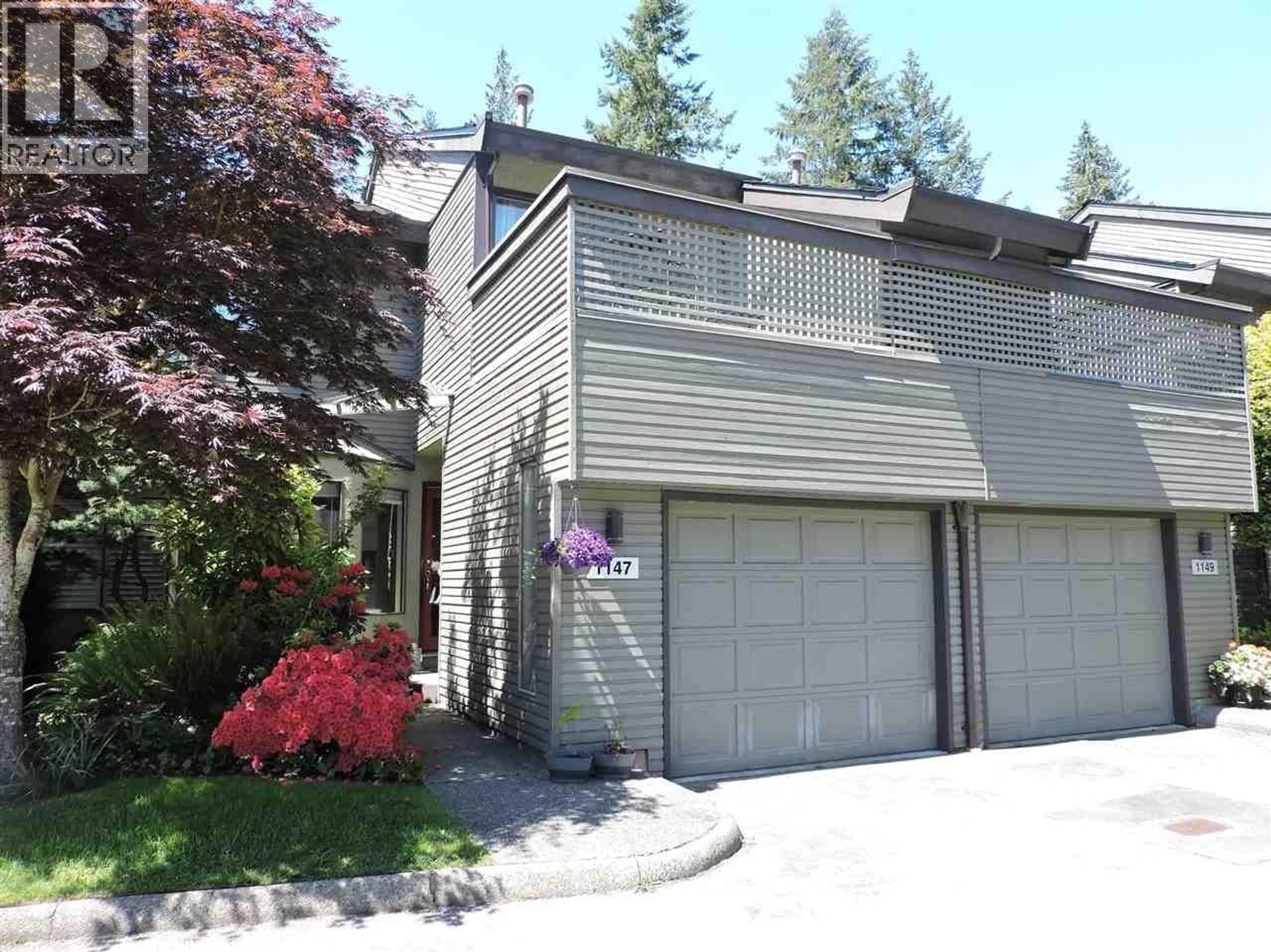 Home with vinyl exterior material, street for 1147 MONTROYAL BOULEVARD, North Vancouver British Columbia V7R2H8