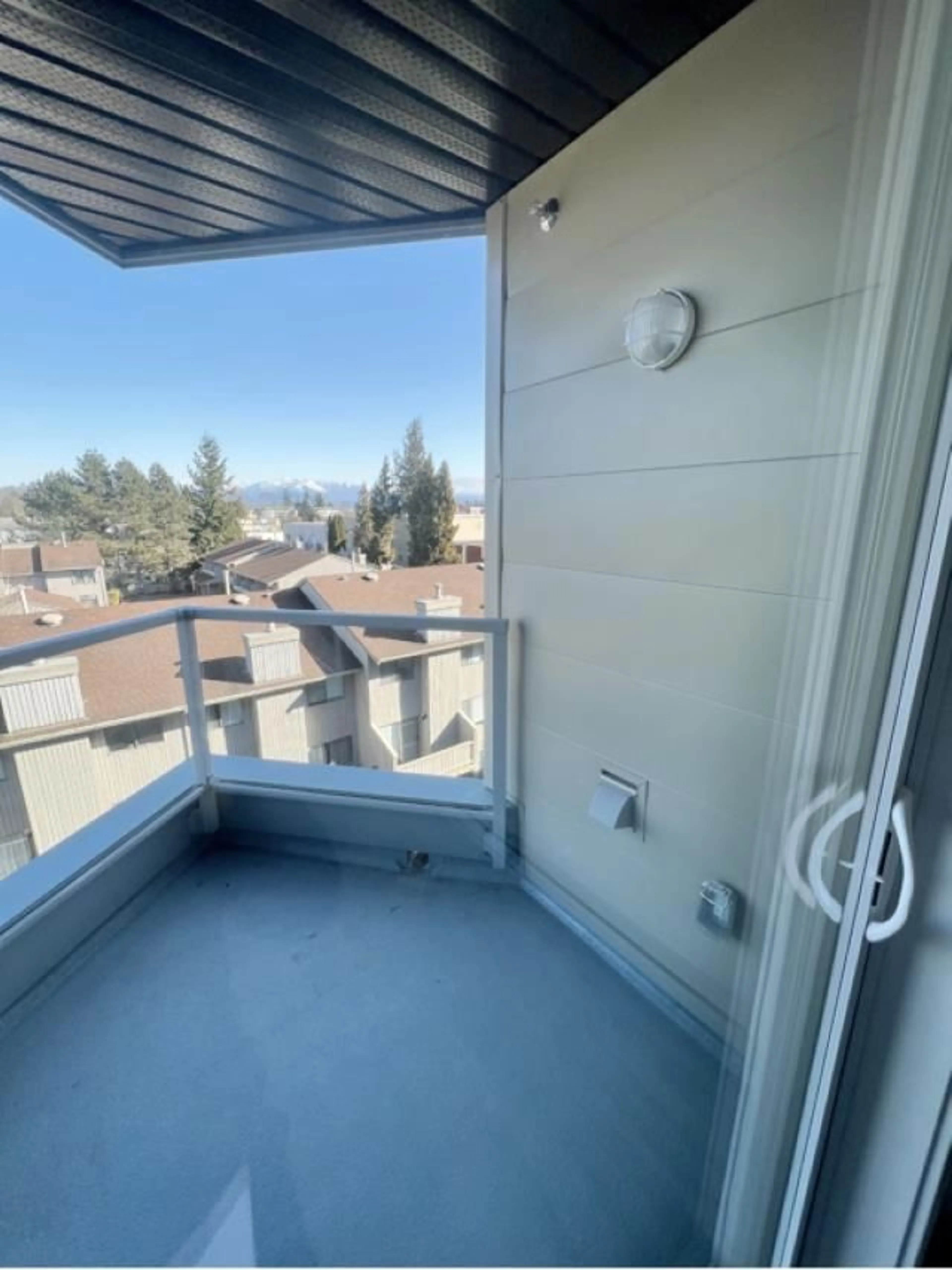 Balcony in the apartment, city buildings view from balcony for 504 - 32838 LANDEAU PLACE, Abbotsford British Columbia V2S0M6