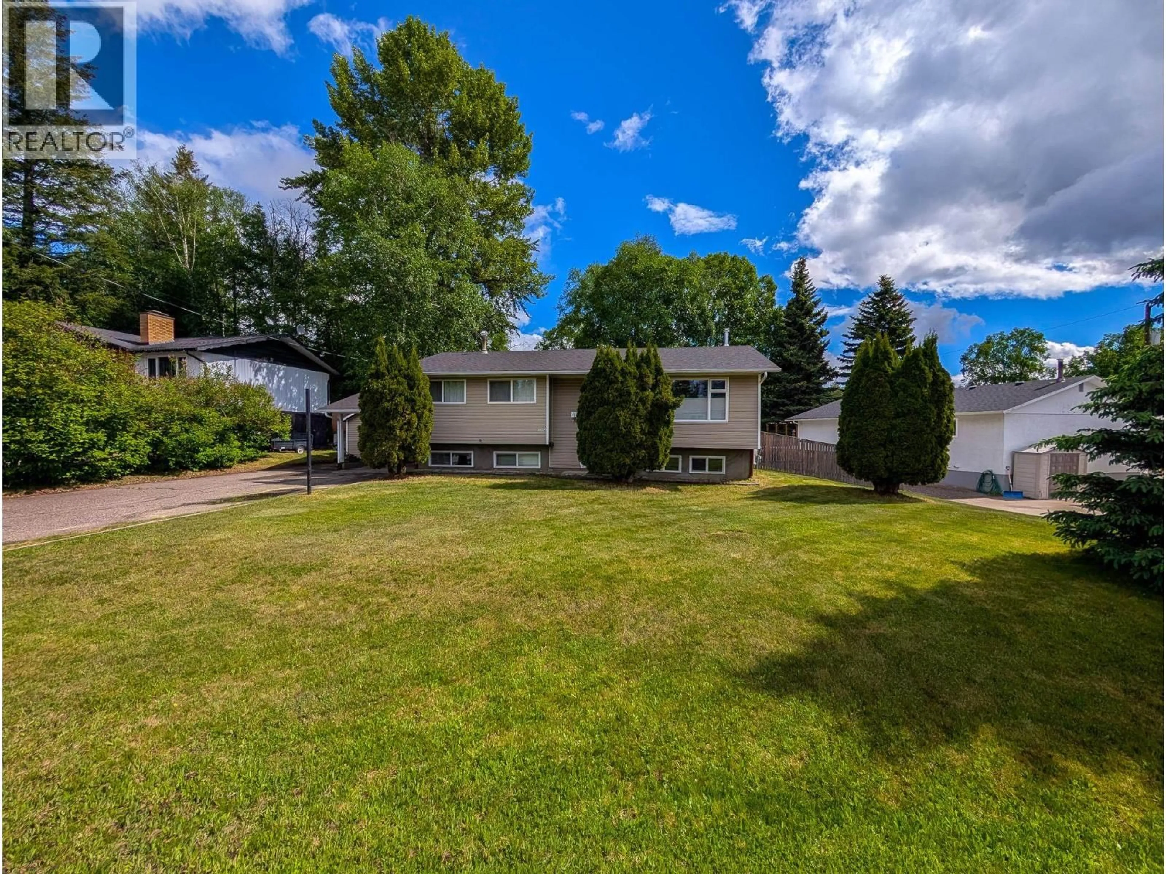 A pic from outside/outdoor area/front of a property/back of a property/a pic from drone, street for 3054 POYNER CRESCENT, Prince George British Columbia V2K1Y1