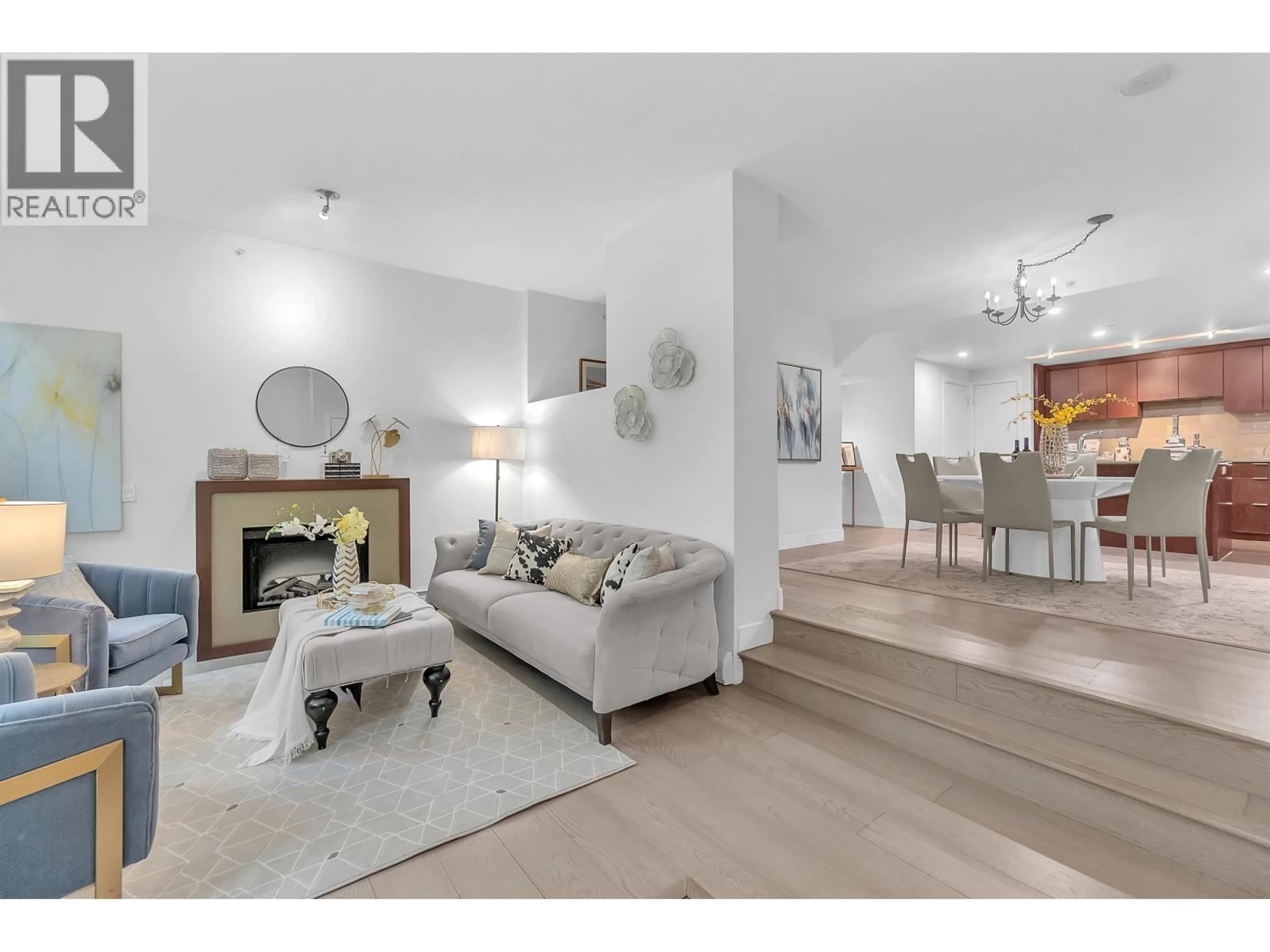 Living room with furniture, wood/laminate floor for 164 13TH STREET, North Vancouver British Columbia V7M1N6