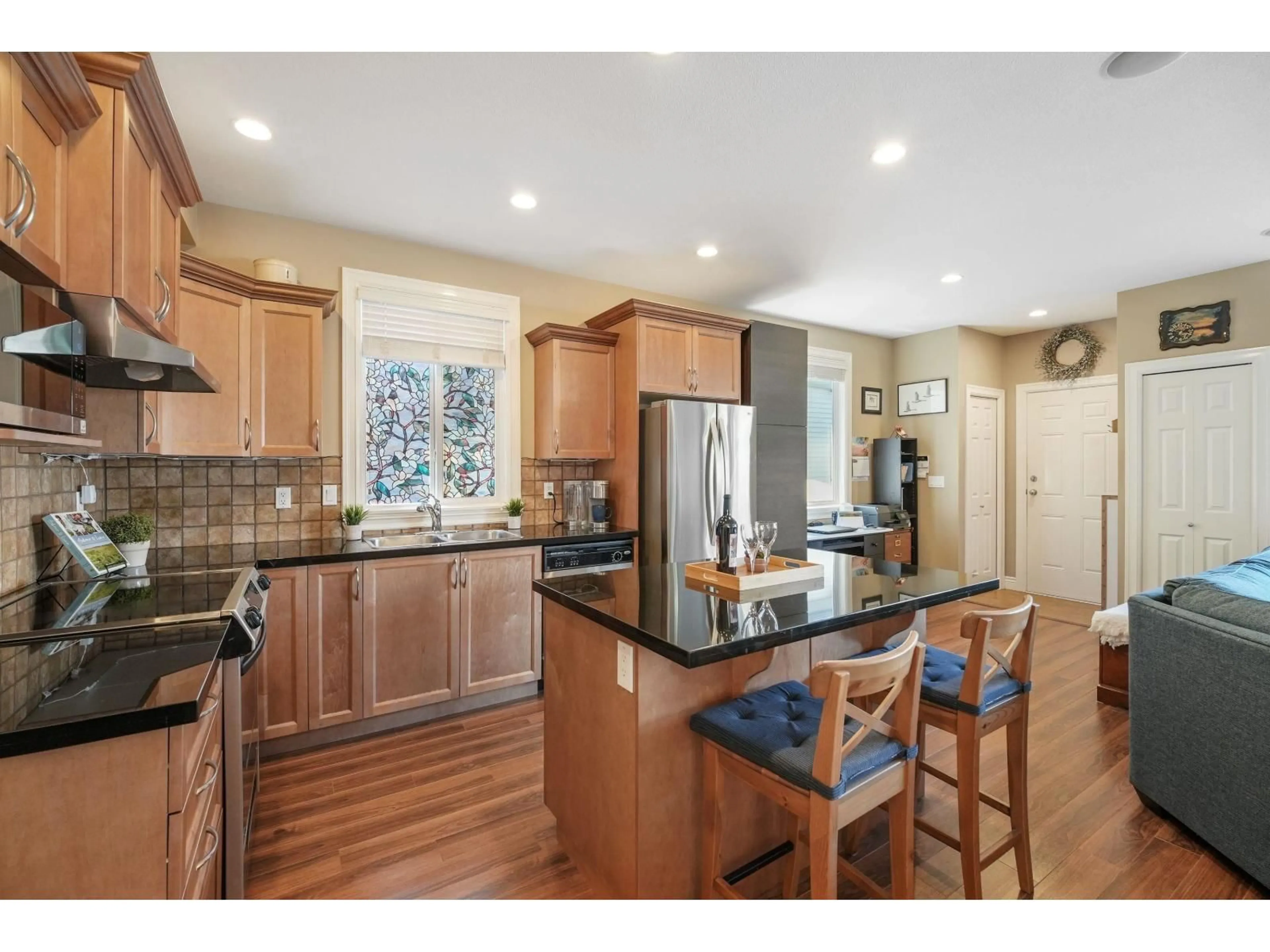 Open concept kitchen, ceramic/tile floor for 19455 66 AVENUE, Surrey British Columbia V4N0C3