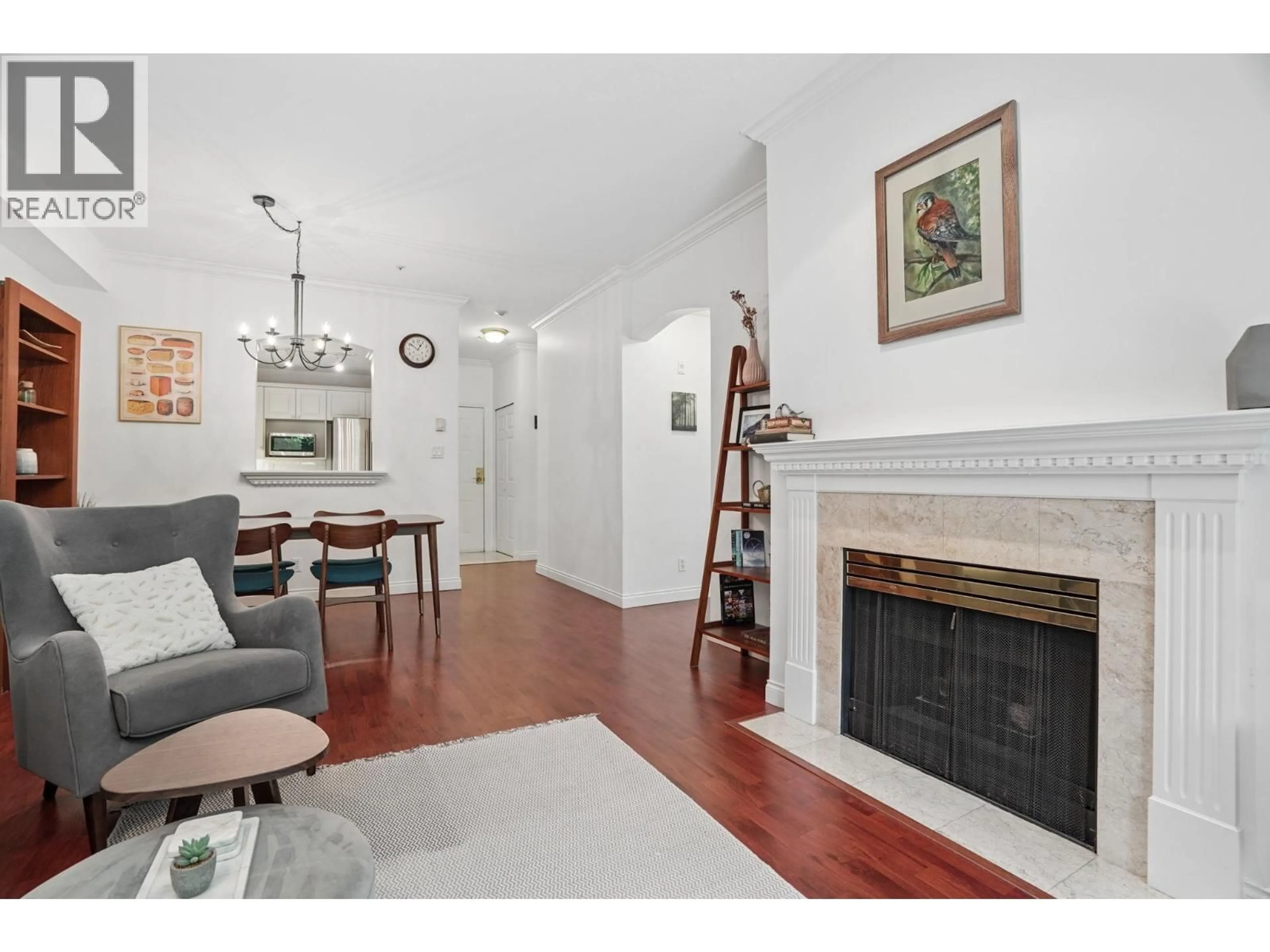 Living room with furniture, wood/laminate floor for 116 - 5835 HAMPTON PLACE, Vancouver British Columbia V6T2G2