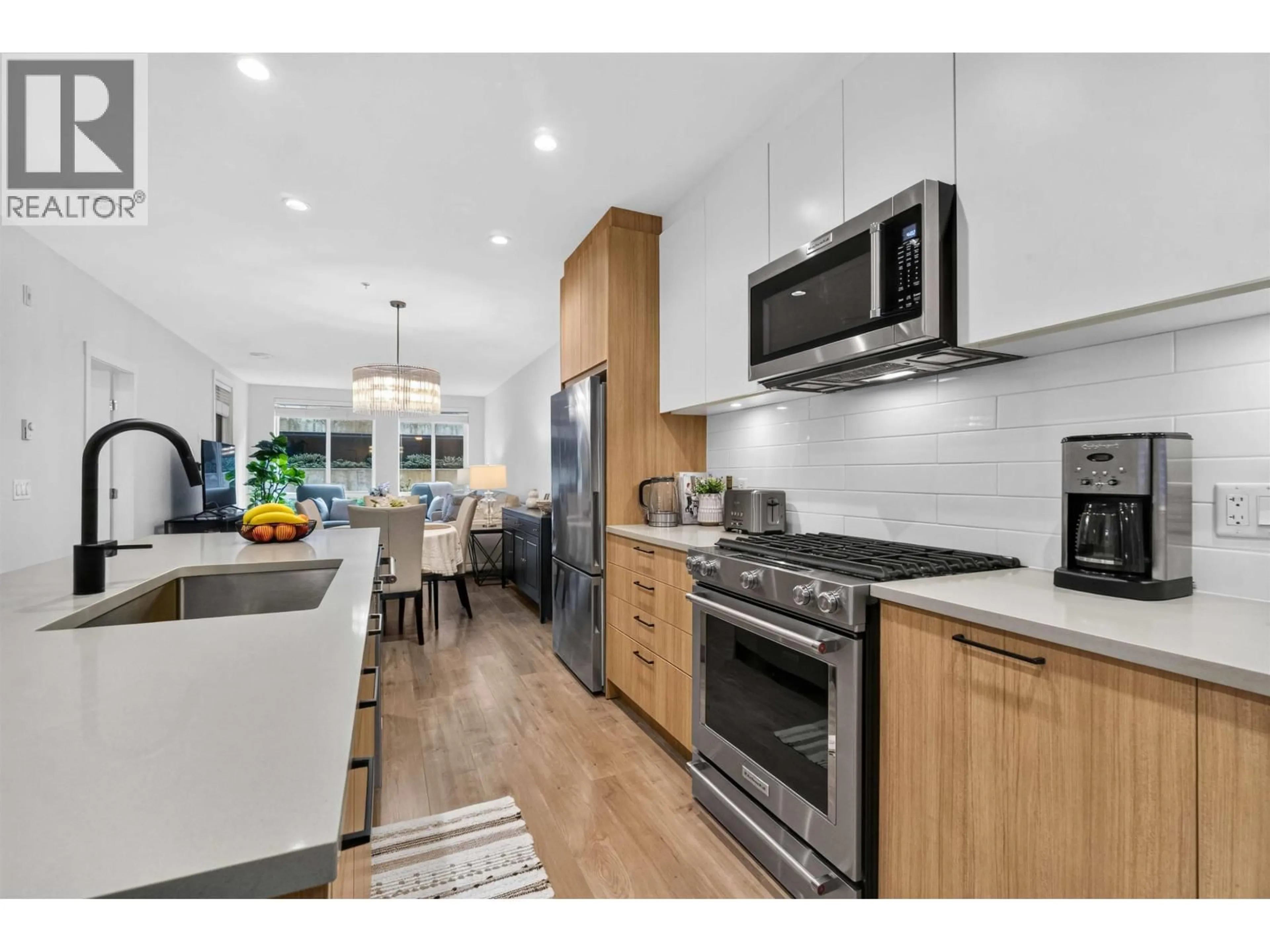 Open concept kitchen, unknown for 103 - 707 COMO LAKE AVENUE, Coquitlam British Columbia V3J0J5