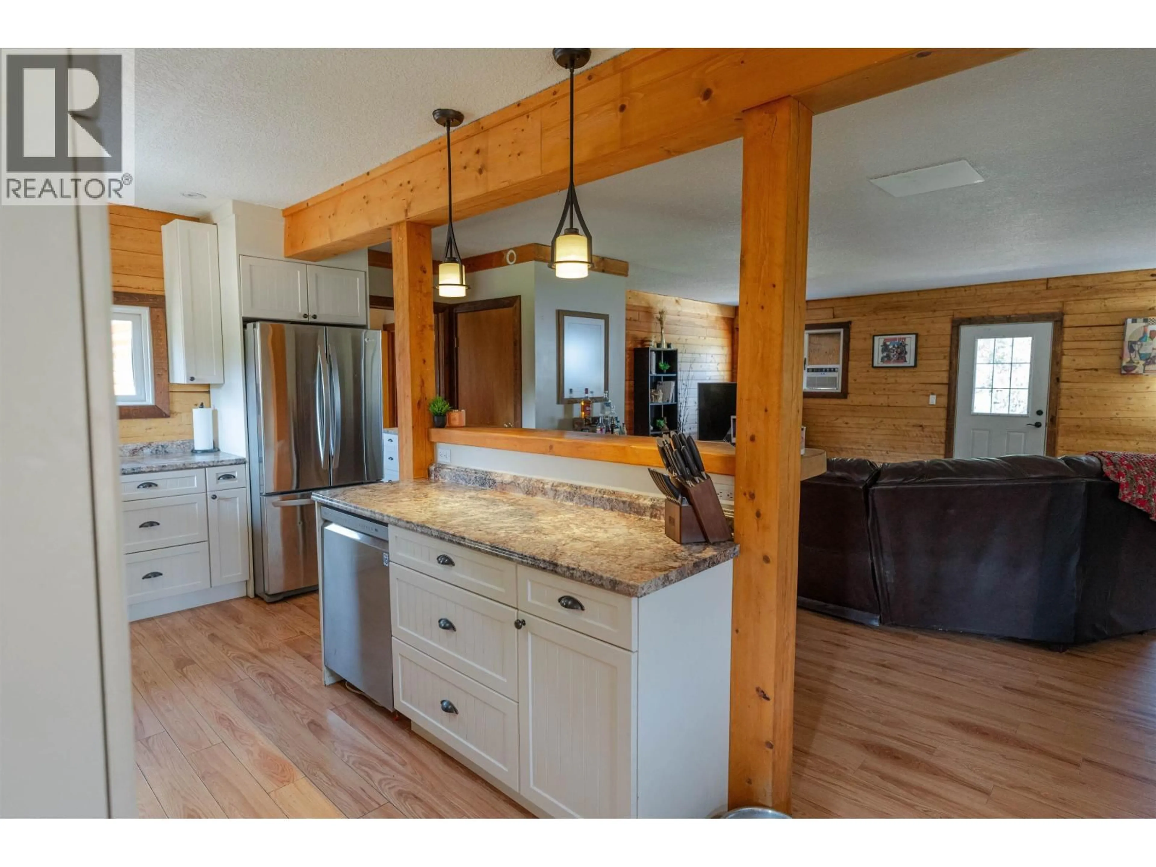 Open concept kitchen, wood/laminate floor for 14246 EVERGREEN SUB, Fort St. John British Columbia V1J4M7