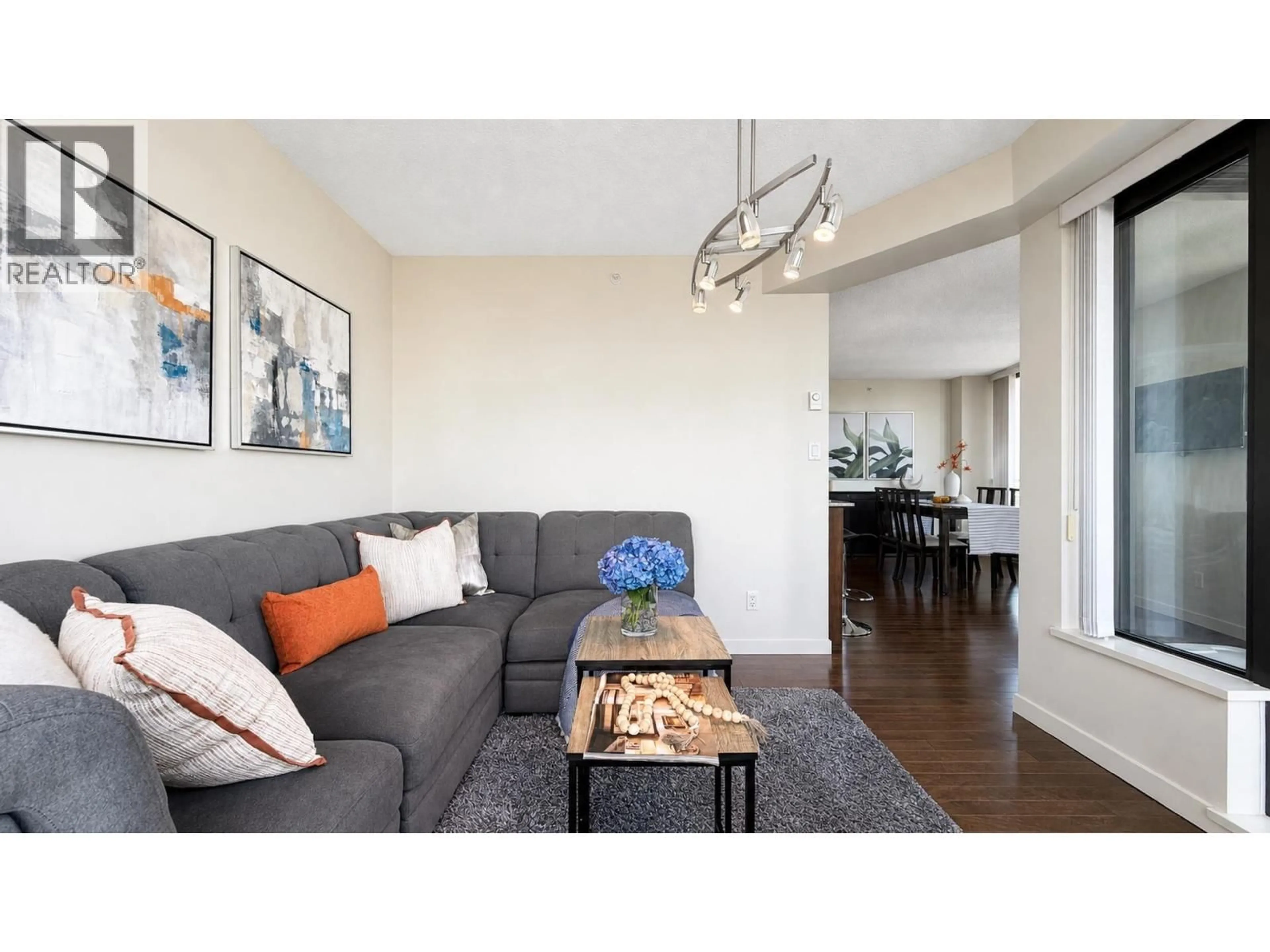 Living room with furniture, wood/laminate floor for 1505 - 5811 NO. 3 ROAD, Richmond British Columbia V6X4L7