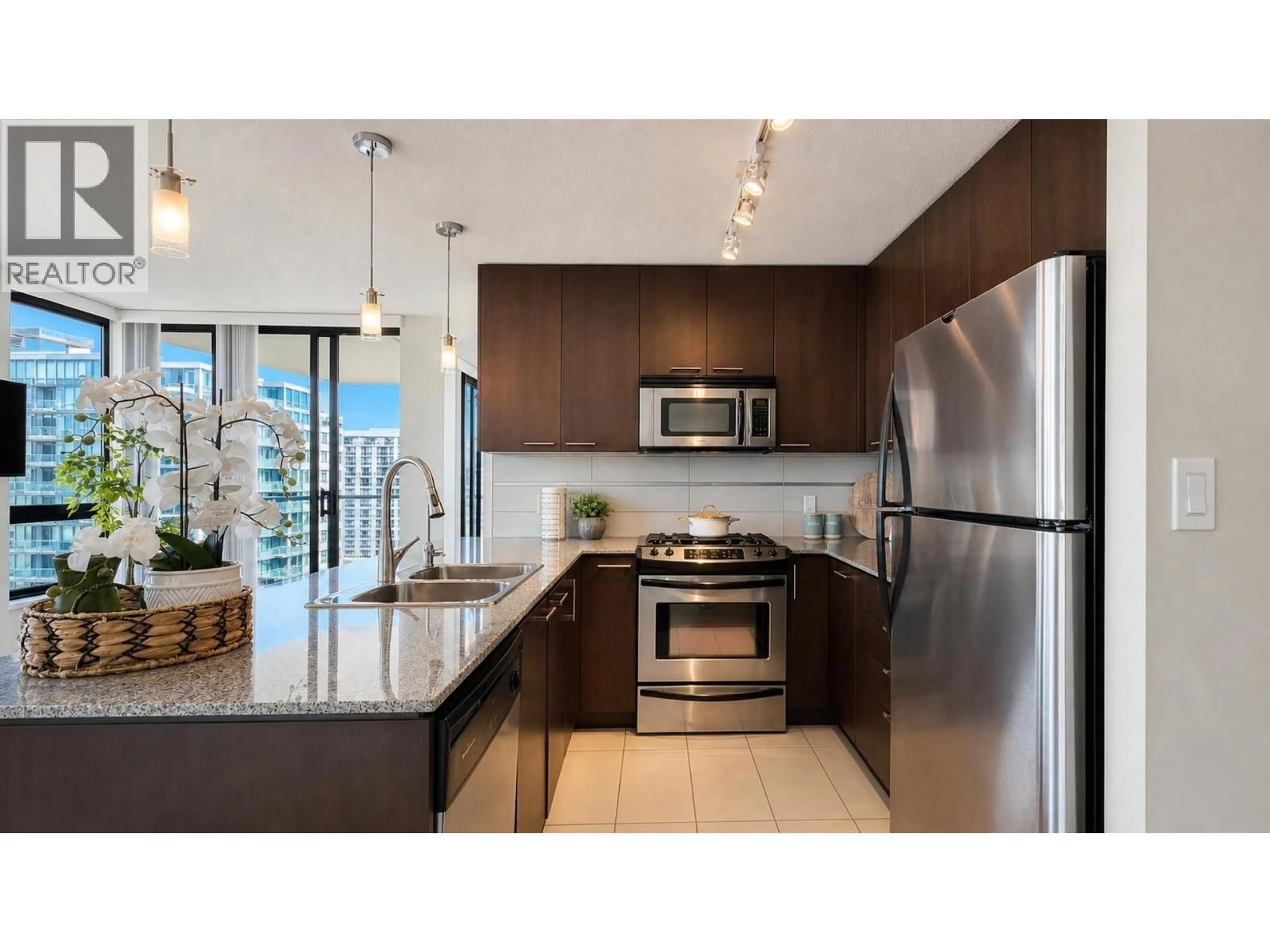 Open concept kitchen, ceramic/tile floor for 1505 - 5811 NO. 3 ROAD, Richmond British Columbia V6X4L7