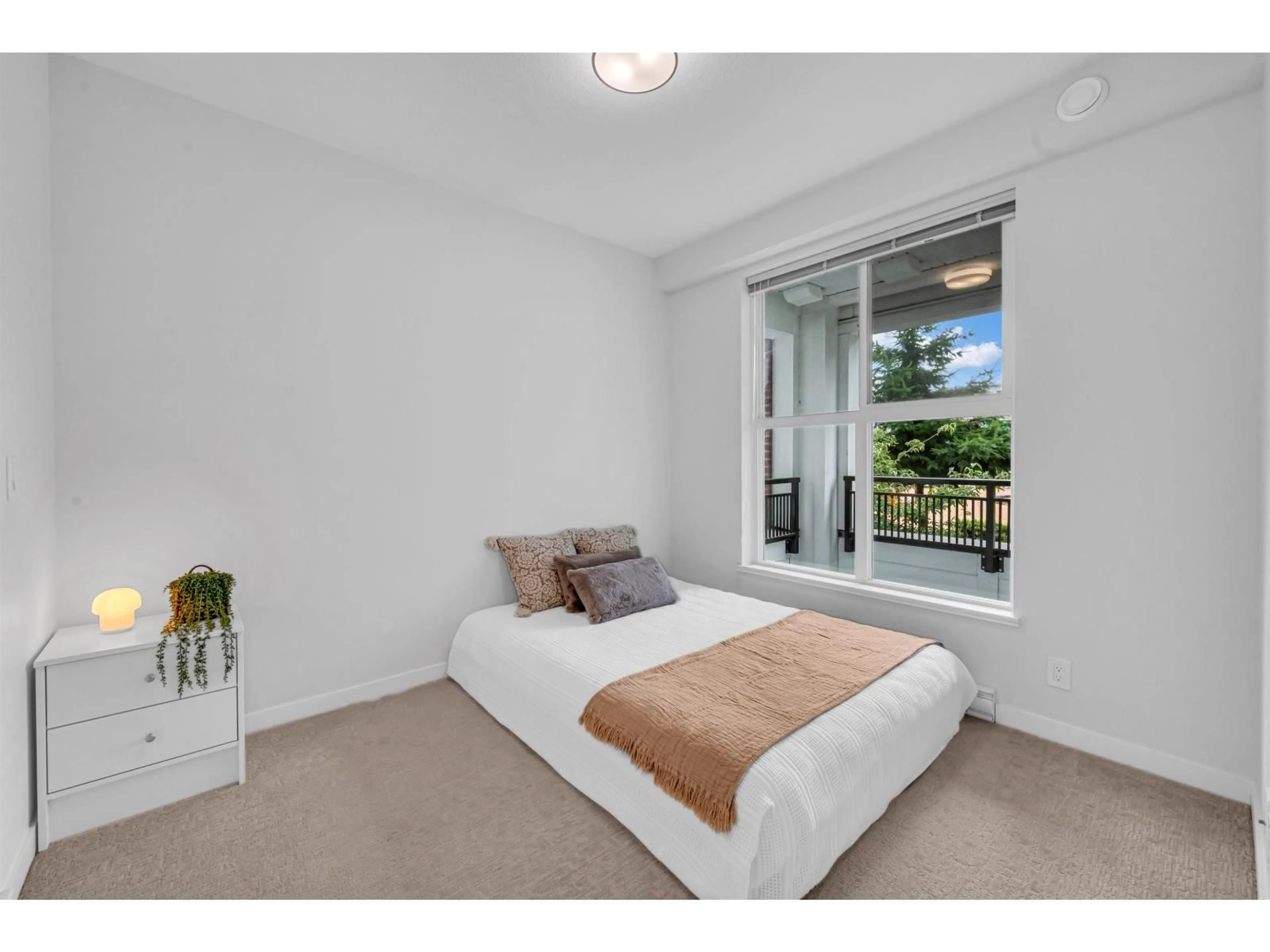 Bedroom with bed, unknown for A205 - 8150 207 STREET, Langley British Columbia V2Y4J2