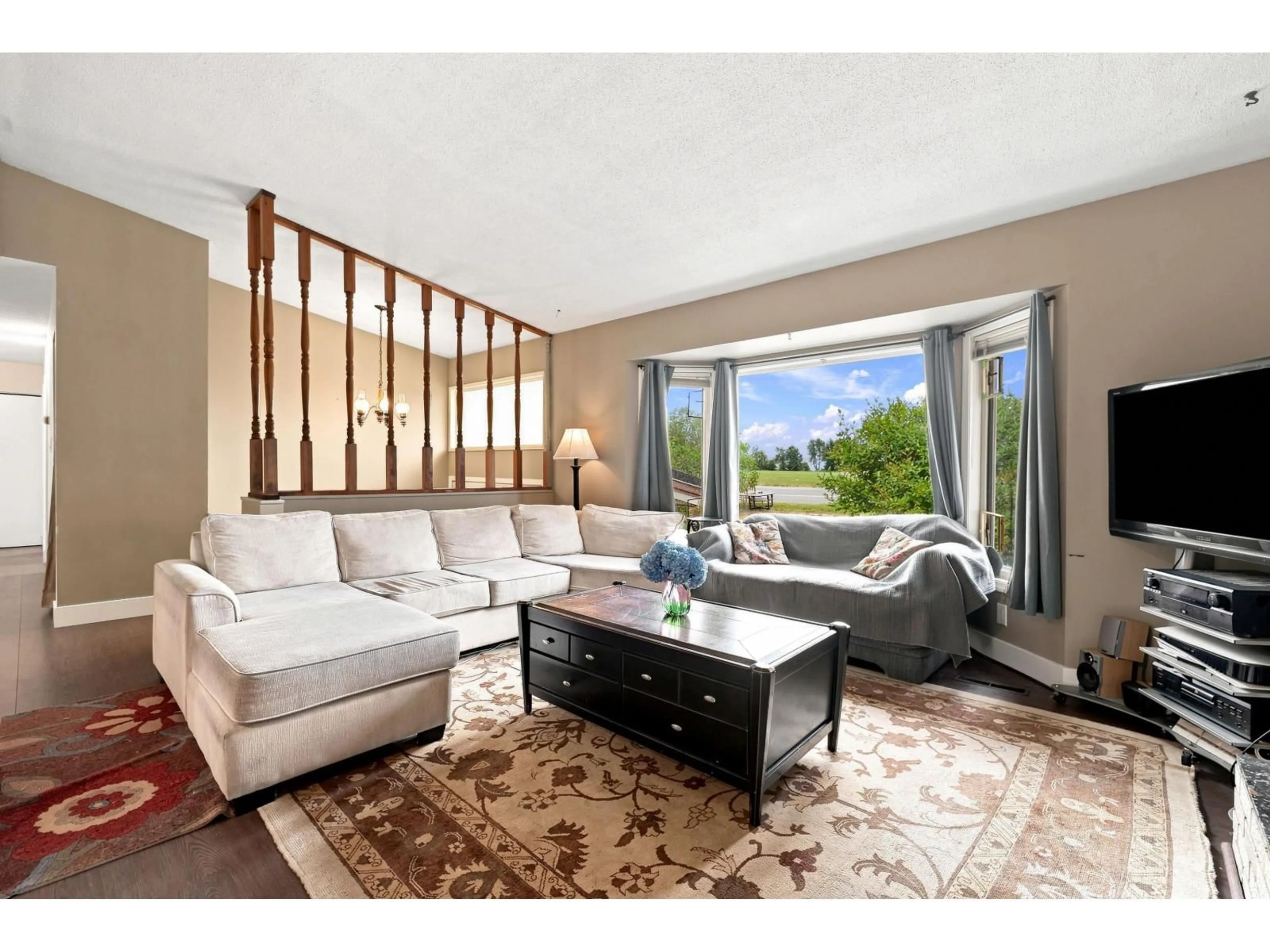 Living room with furniture, unknown for 10425 YOUNG ROAD, Chilliwack British Columbia V2P8C4