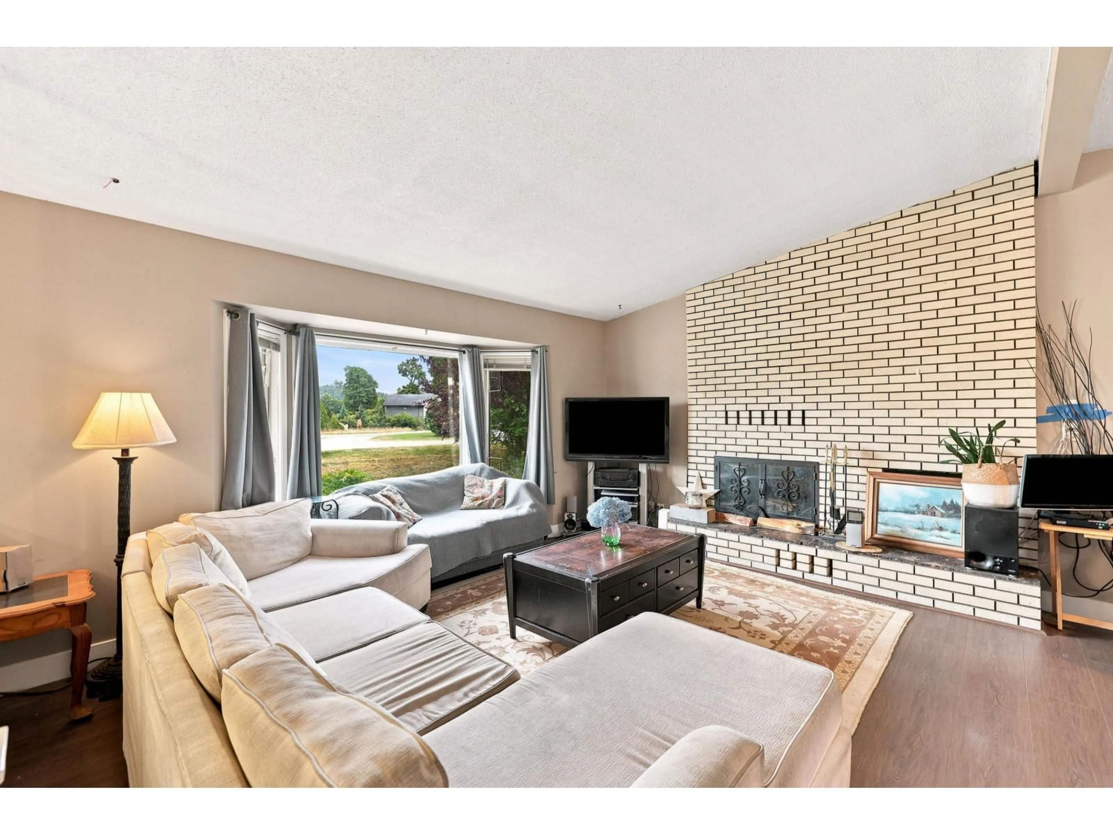 Living room with furniture, unknown for 10425 YOUNG ROAD, Chilliwack British Columbia V2P8C4