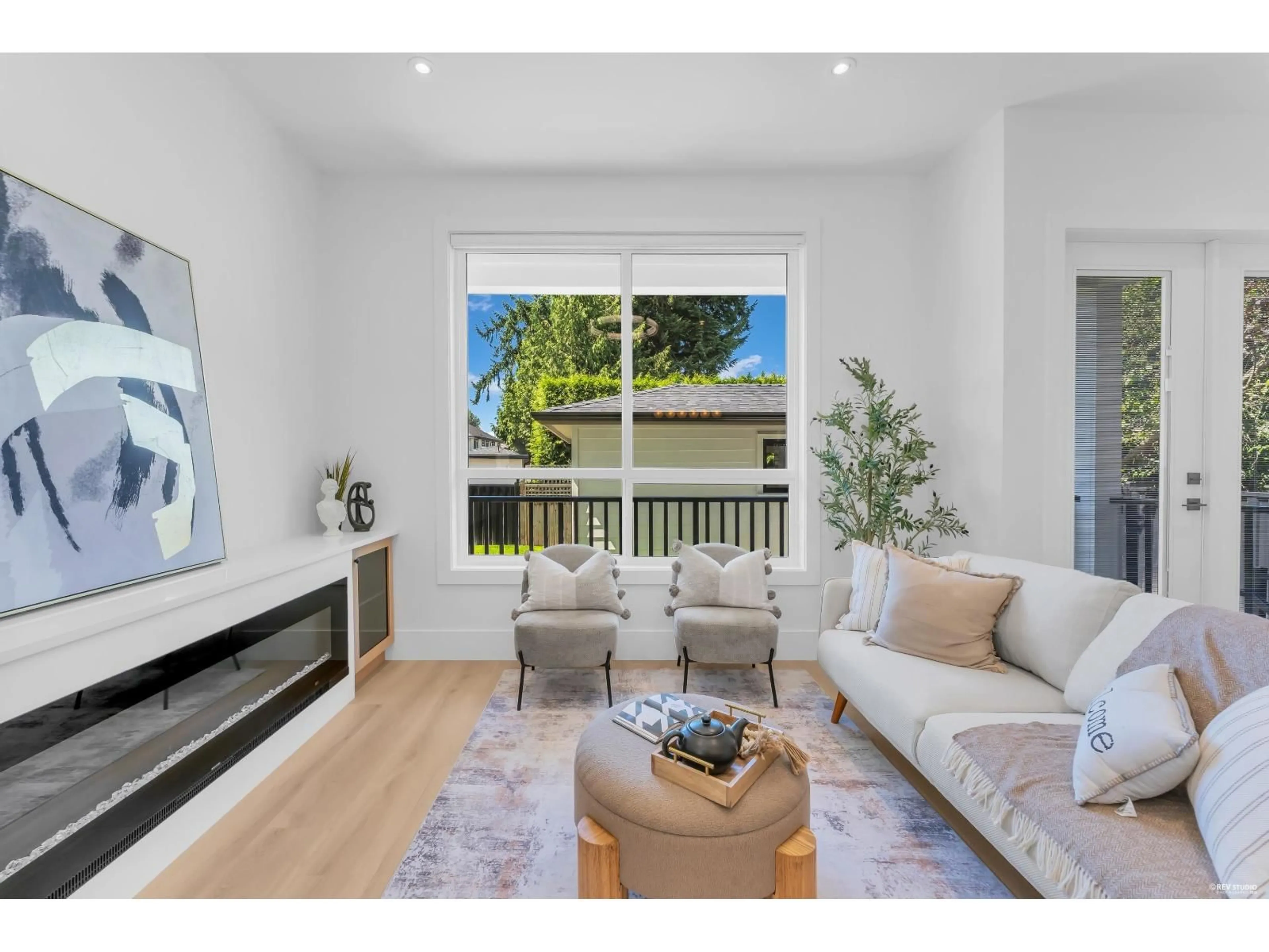 Living room with furniture, wood/laminate floor for 8221 111B STREET, Delta British Columbia V4C4T2