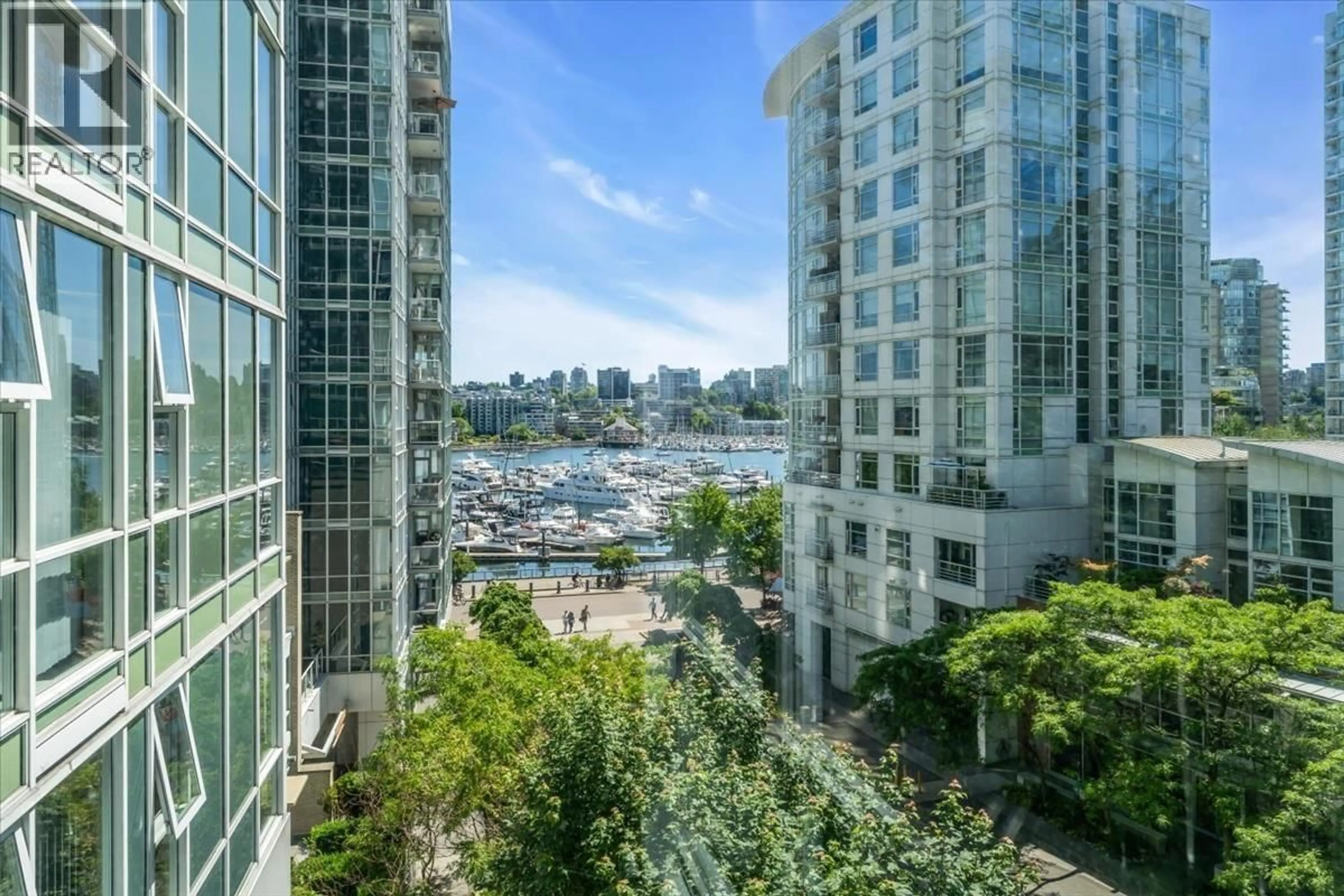 Patio, city buildings view from balcony for 602 - 193 AQUARIUS MEWS, Vancouver British Columbia V6Z2Z2