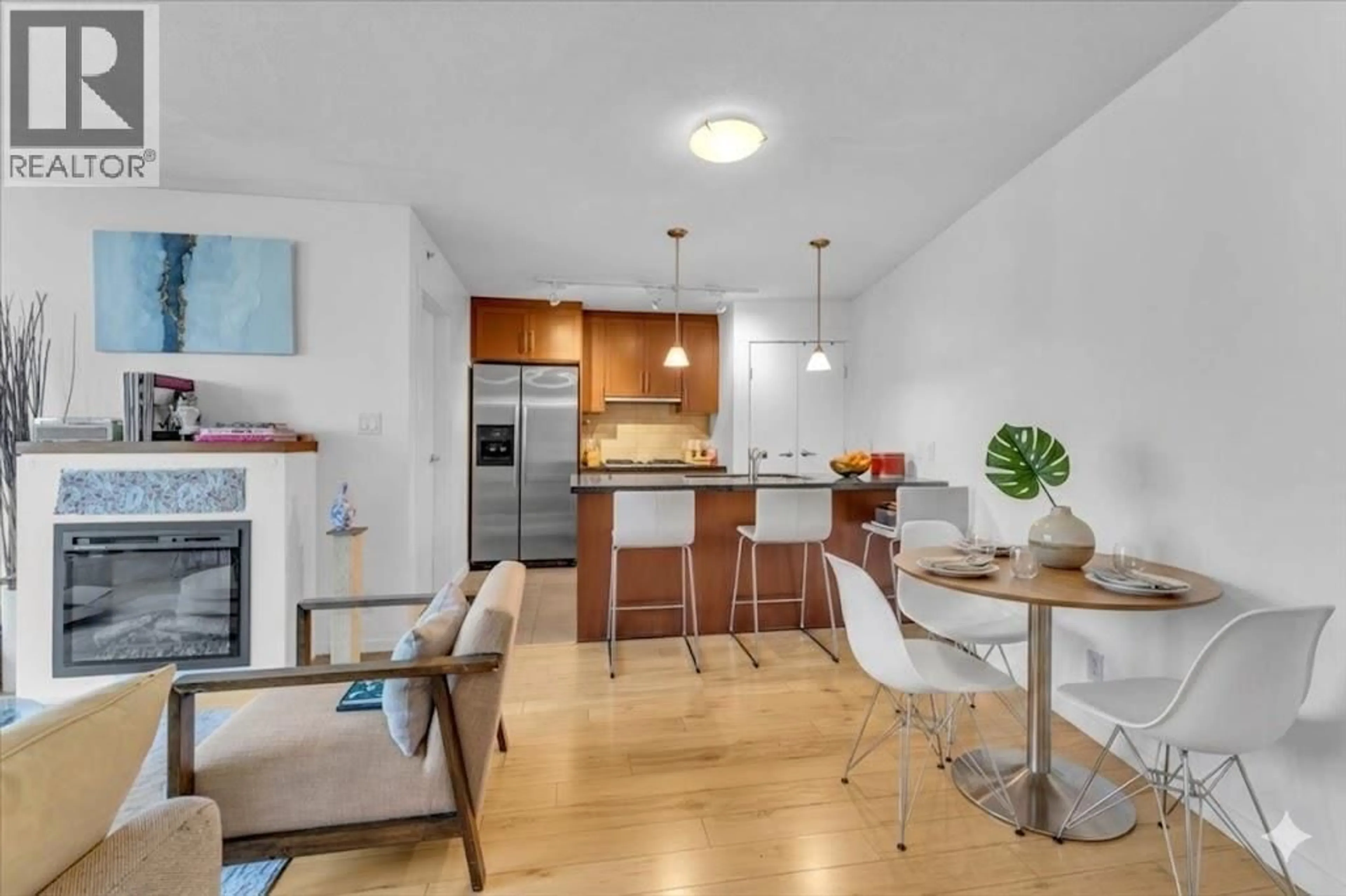 Open concept kitchen, wood/laminate floor for 1707 - 1189 MELVILLE STREET, Vancouver British Columbia V6E4T8