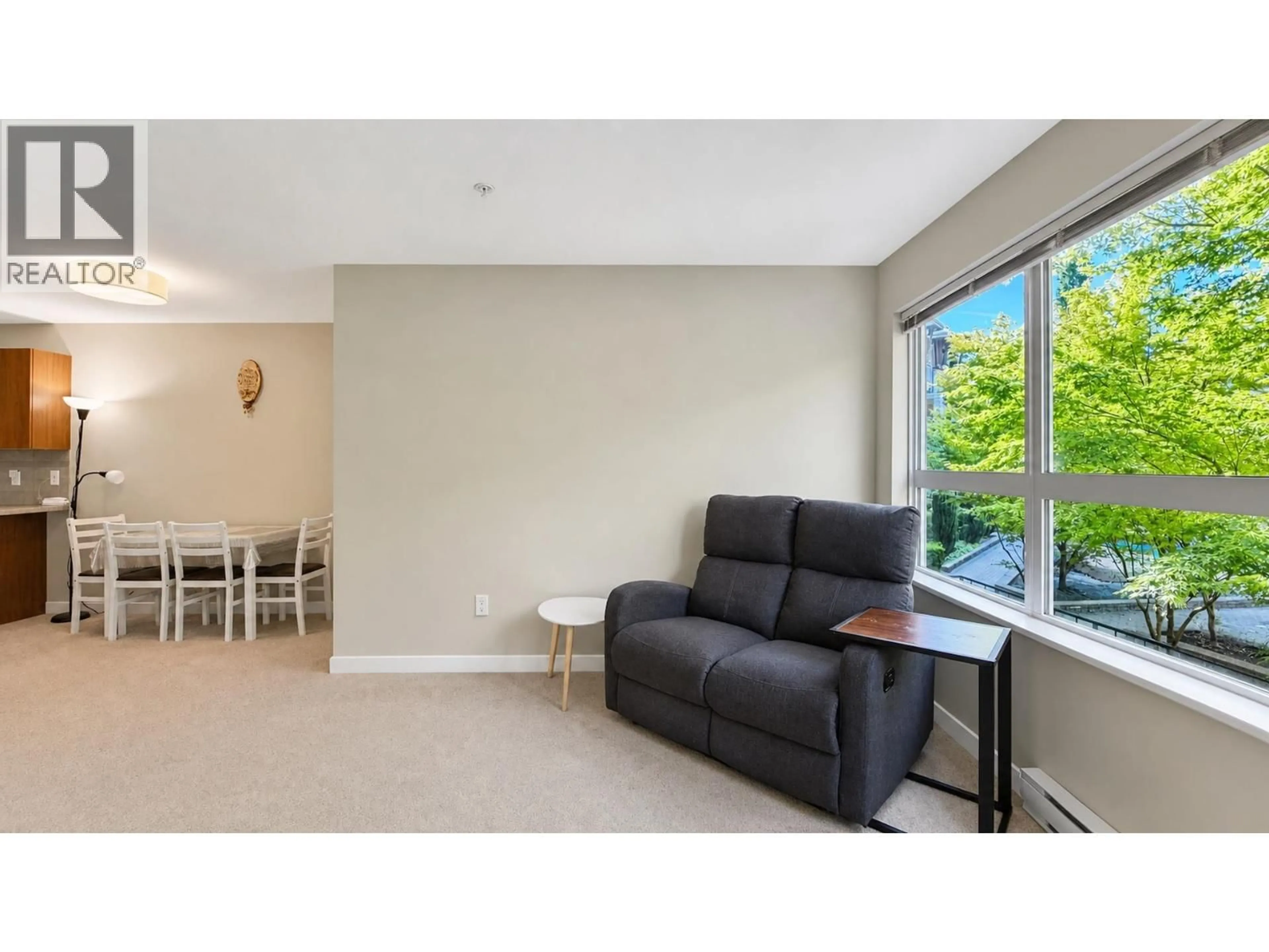Living room with furniture, unknown for 212 - 6828 ECKERSLEY ROAD, Richmond British Columbia V6Y0E8