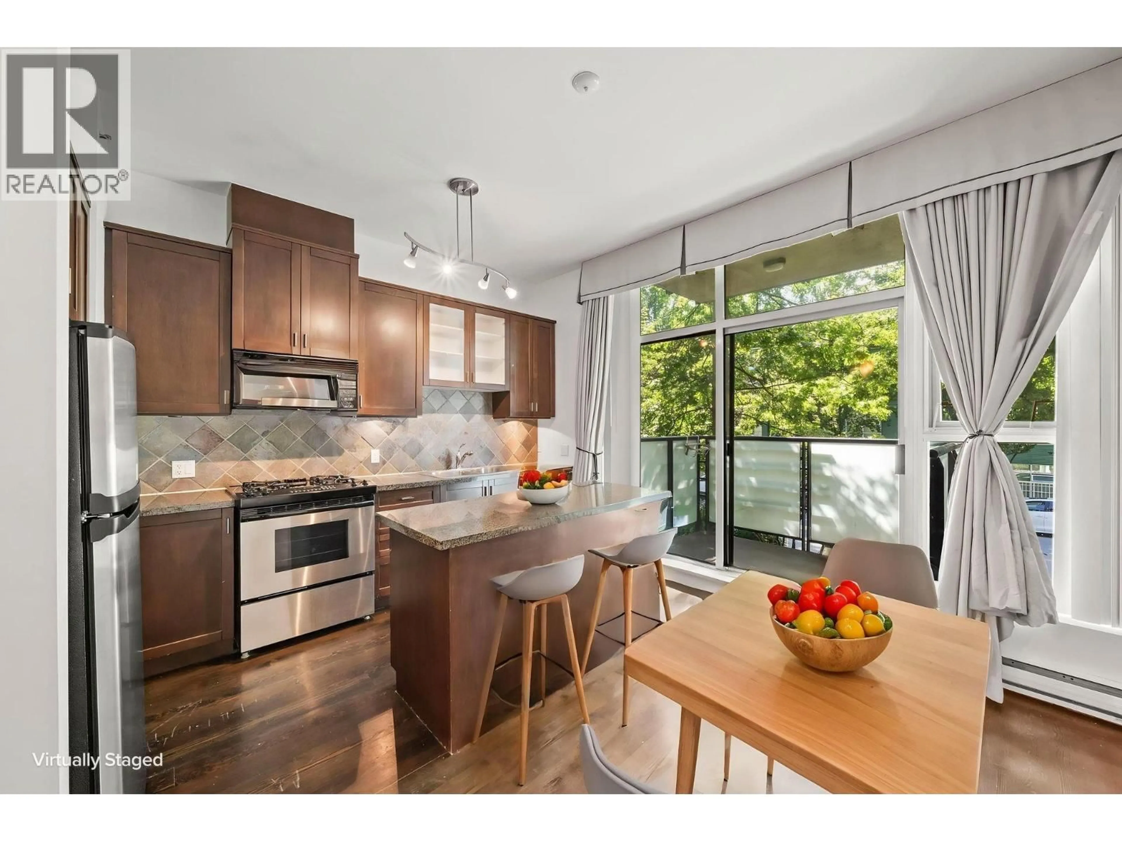 Open concept kitchen, wood/laminate floor for 205 - 8988 HUDSON STREET, Vancouver British Columbia V6P6Z1