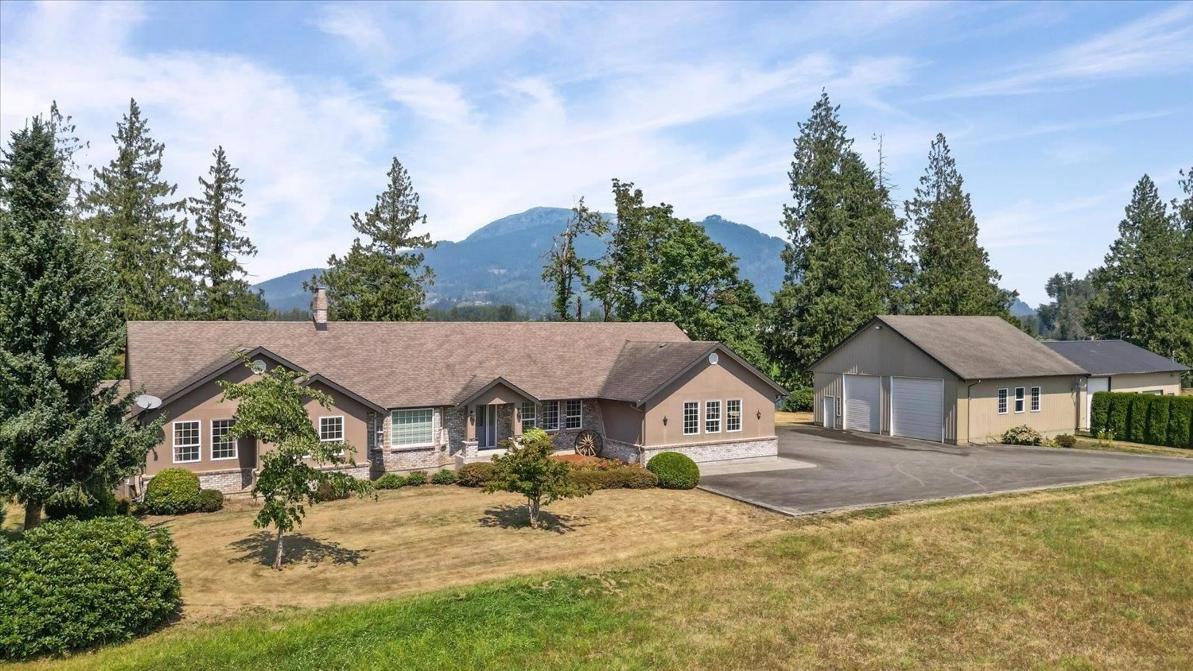 A pic from outside/outdoor area/front of a property/back of a property/a pic from drone, mountain view for 47083 BELL ROAD, Chilliwack British Columbia V2P6H5