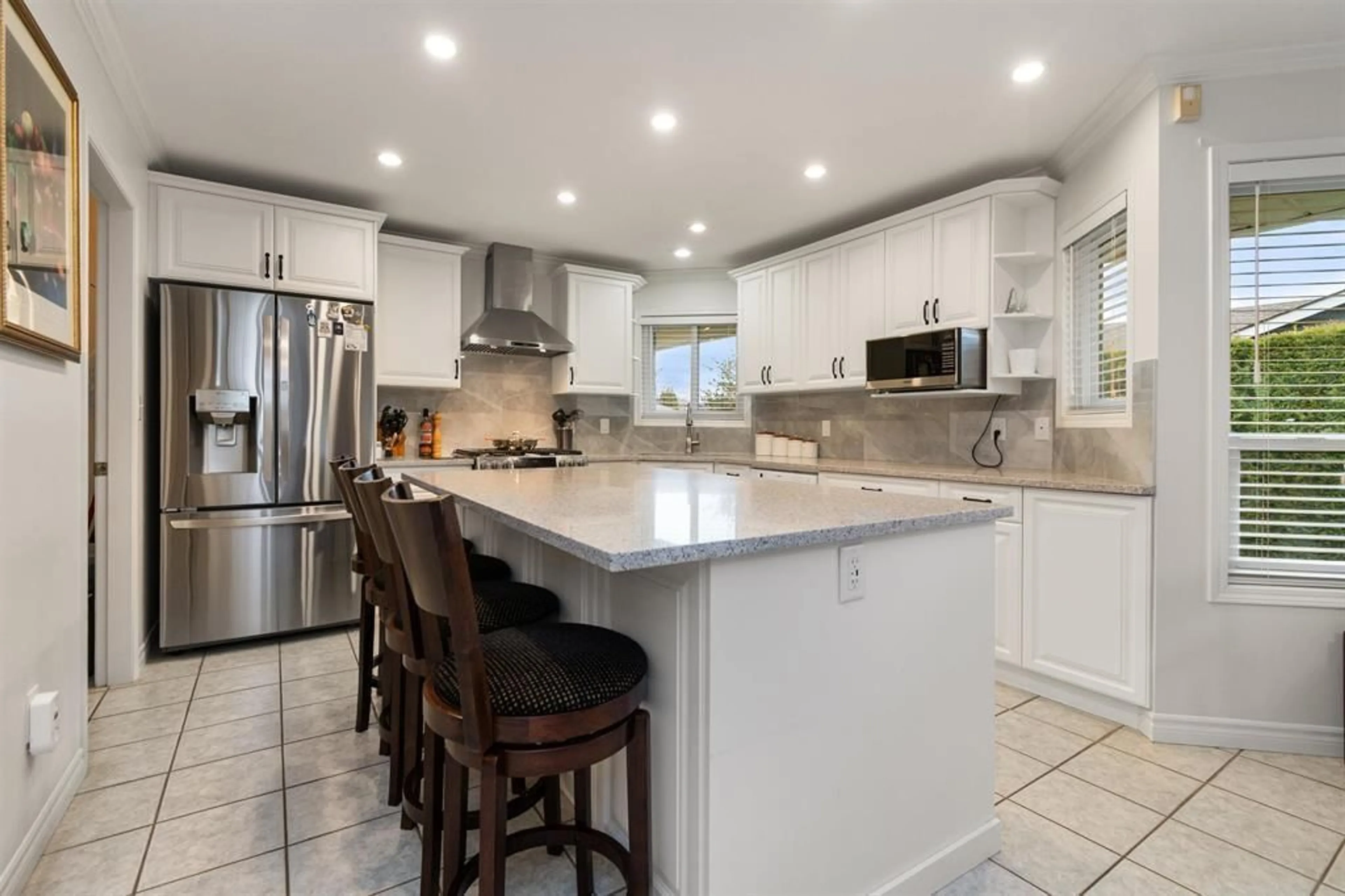 Open concept kitchen, ceramic/tile floor for 6792 HENRY STREET, Chilliwack British Columbia V2R2W1