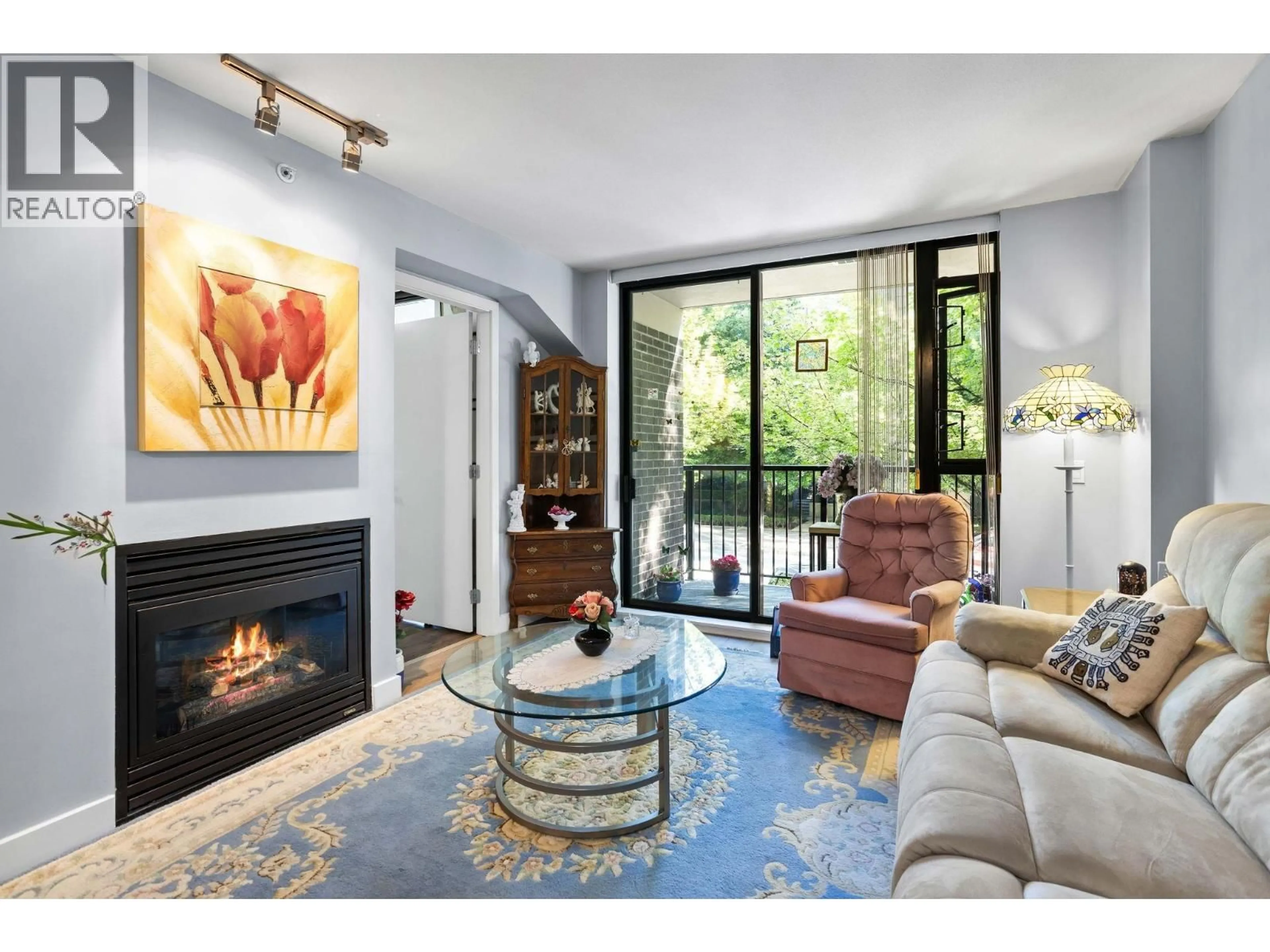 Living room with furniture, unknown for 205 - 175 1ST STREET, North Vancouver British Columbia V7M3N9