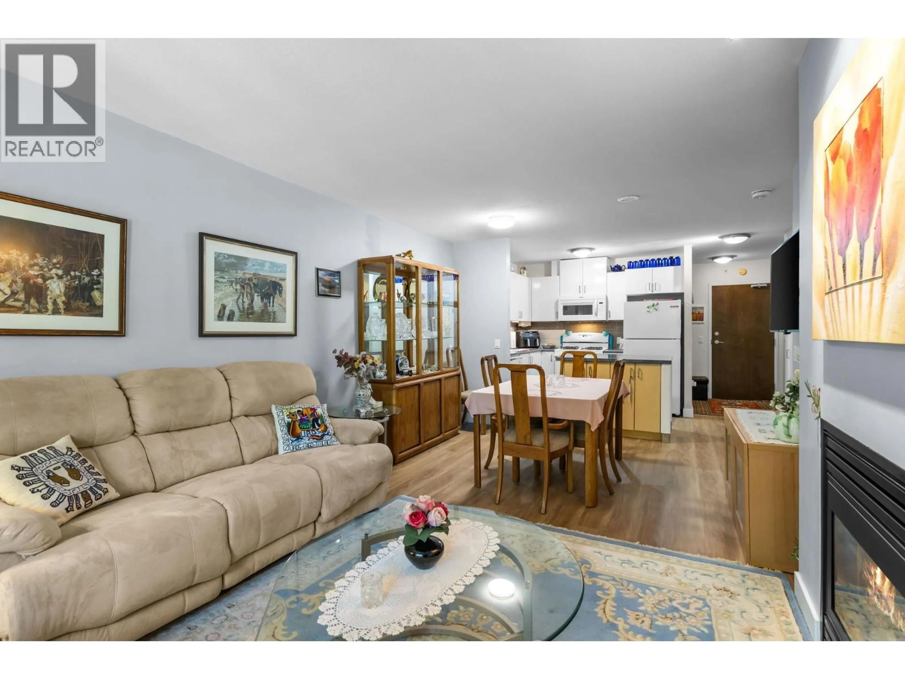 Living room with furniture, unknown for 205 - 175 1ST STREET, North Vancouver British Columbia V7M3N9