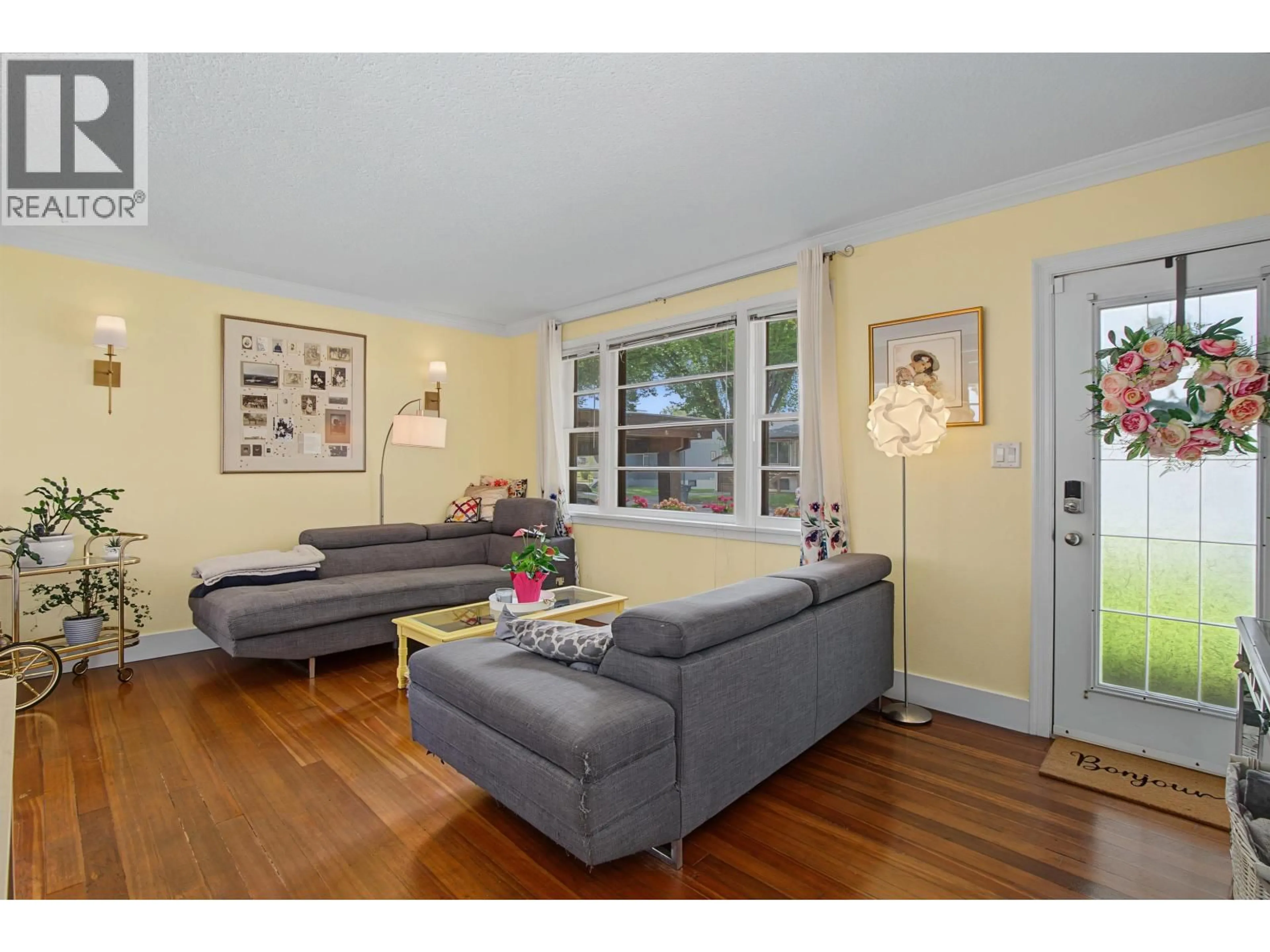 Living room with furniture, wood/laminate floor for 1450 FIR STREET, Prince George British Columbia V2L1E3