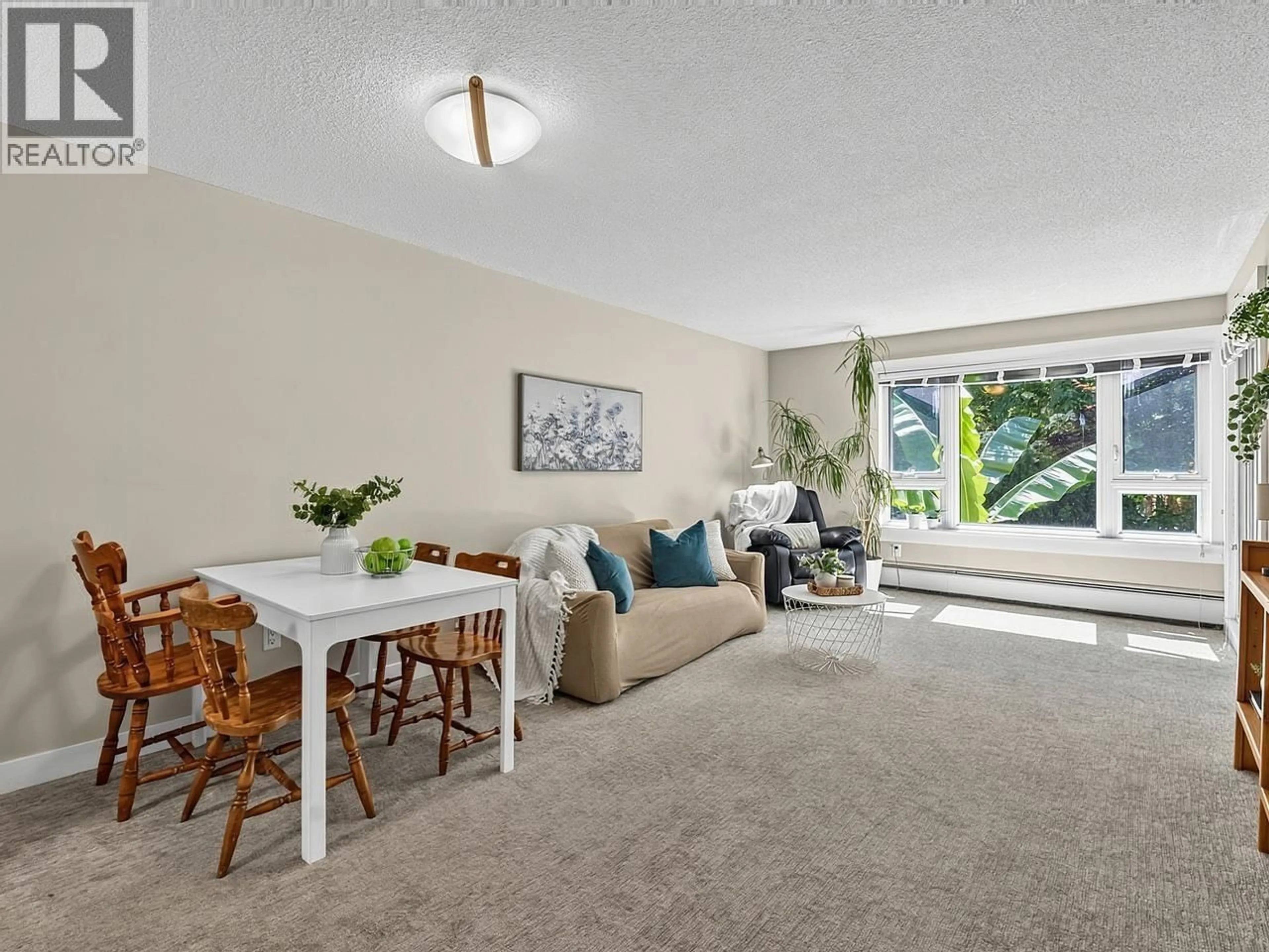 Living room with furniture, carpet floor for 202 - 1750 MAPLE STREET, Vancouver British Columbia V6J3S6