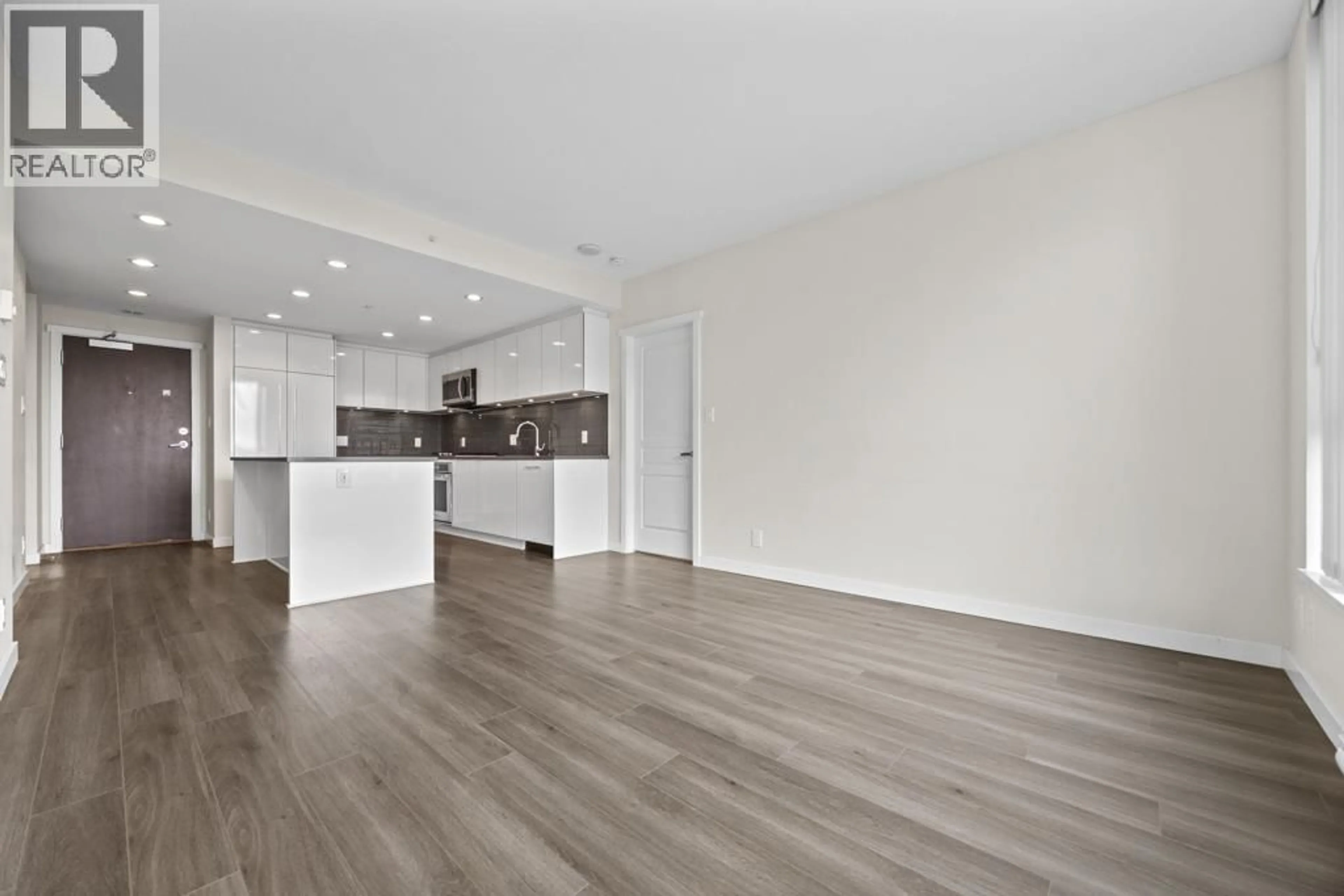 Open concept kitchen, wood/laminate floor for 2404 - 3100 WINDSOR GATE, Coquitlam British Columbia V3B0P3