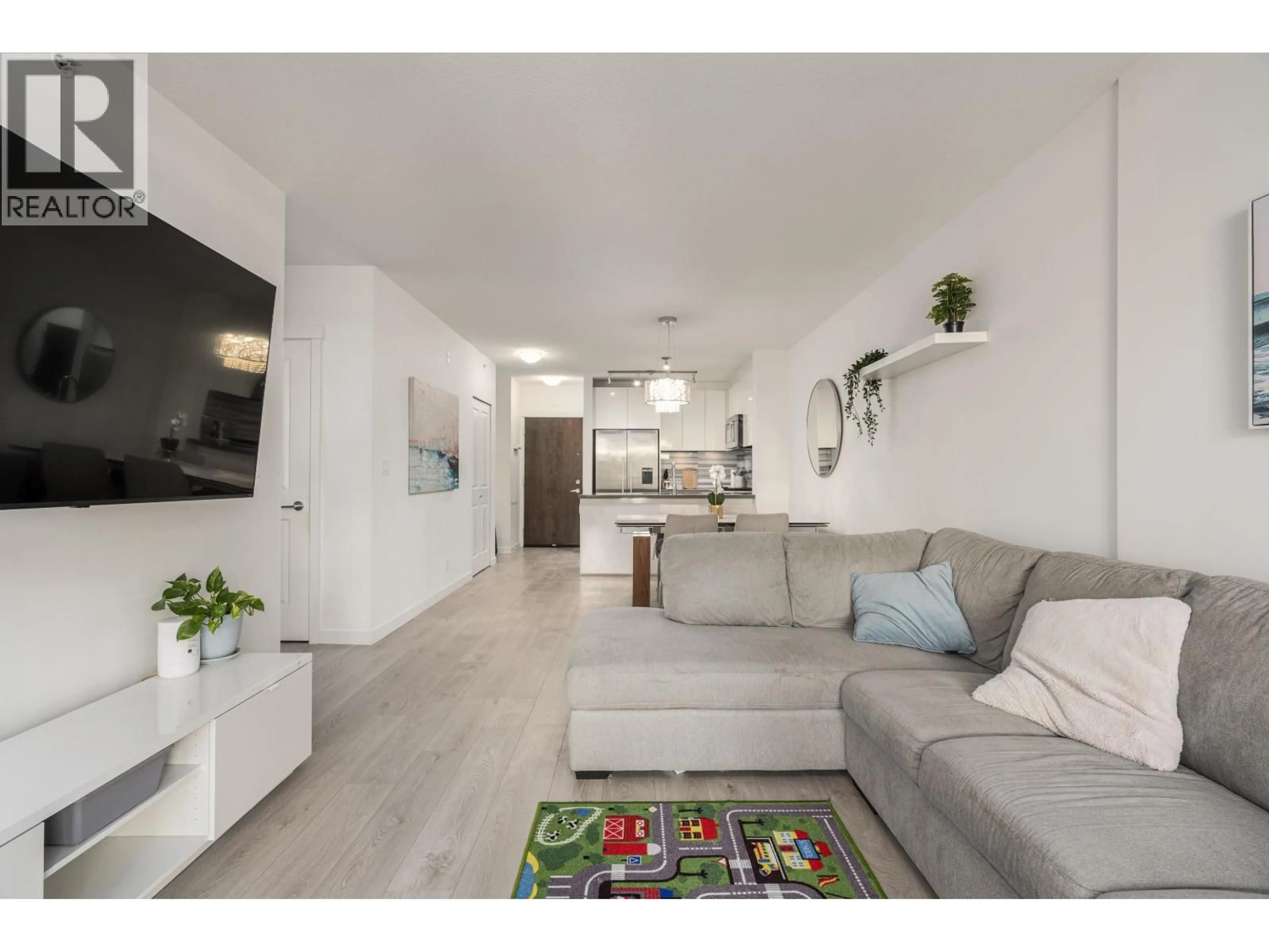 Living room with furniture, unknown for 210 - 3168 RIVERWALK AVENUE, Vancouver British Columbia V5S0B8