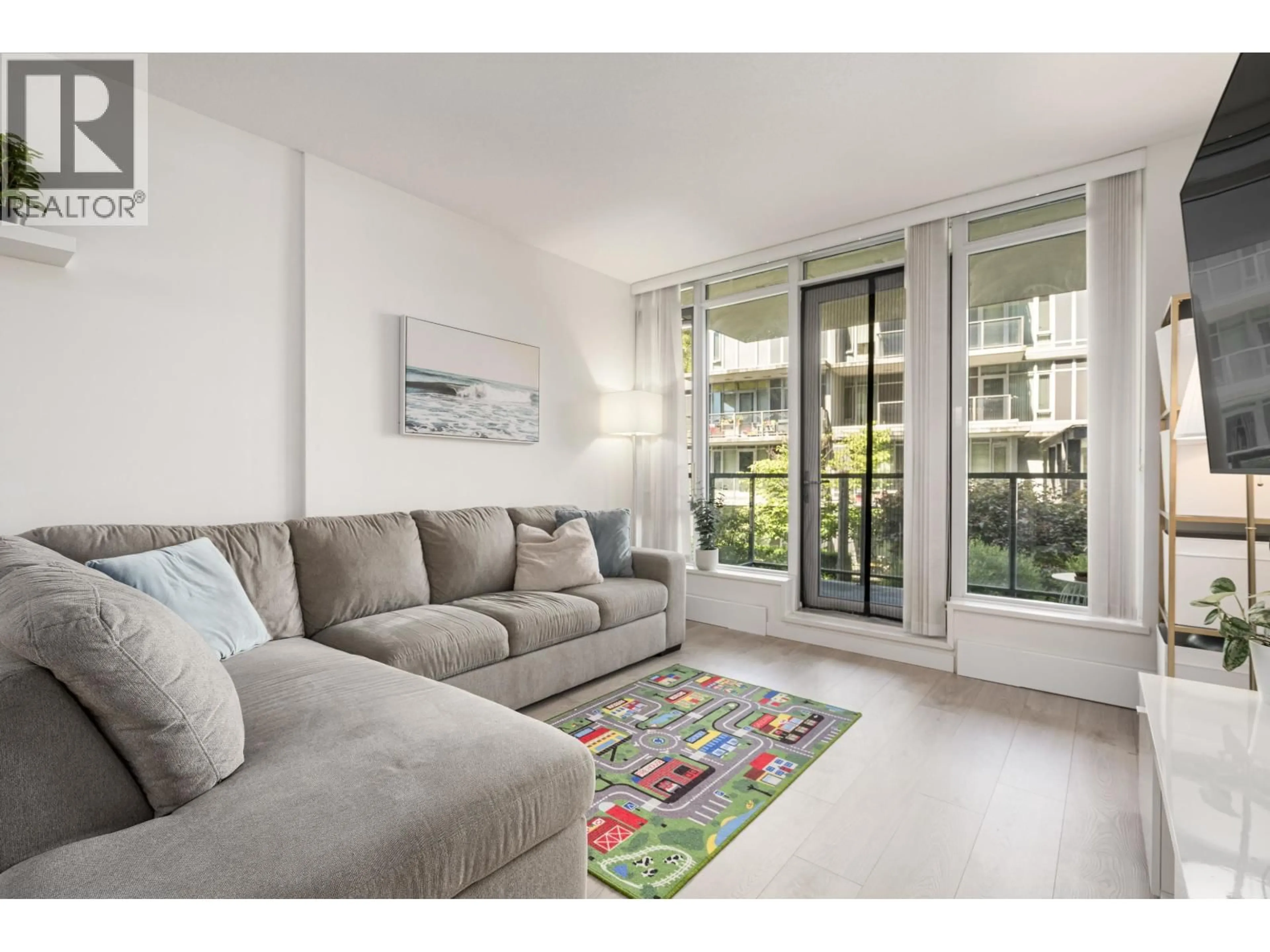 Living room with furniture, unknown for 210 - 3168 RIVERWALK AVENUE, Vancouver British Columbia V5S0B8