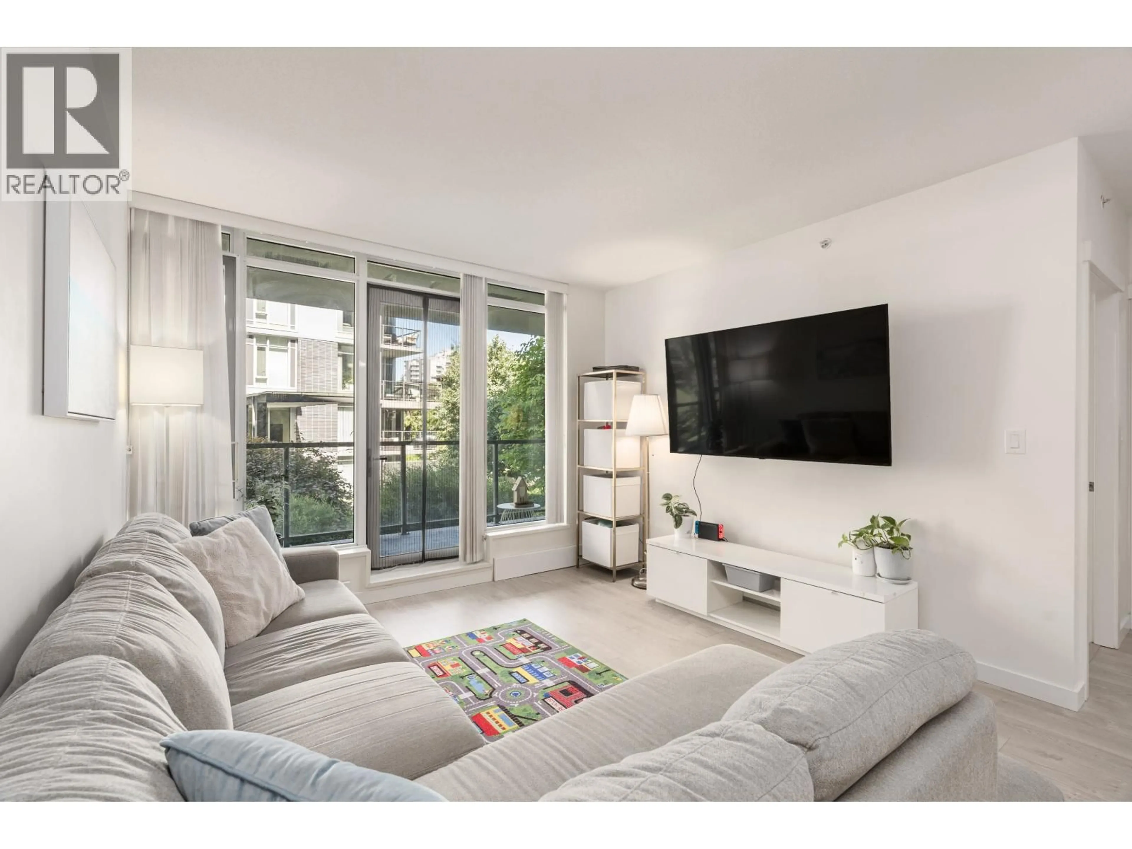 Living room with furniture, unknown for 210 - 3168 RIVERWALK AVENUE, Vancouver British Columbia V5S0B8