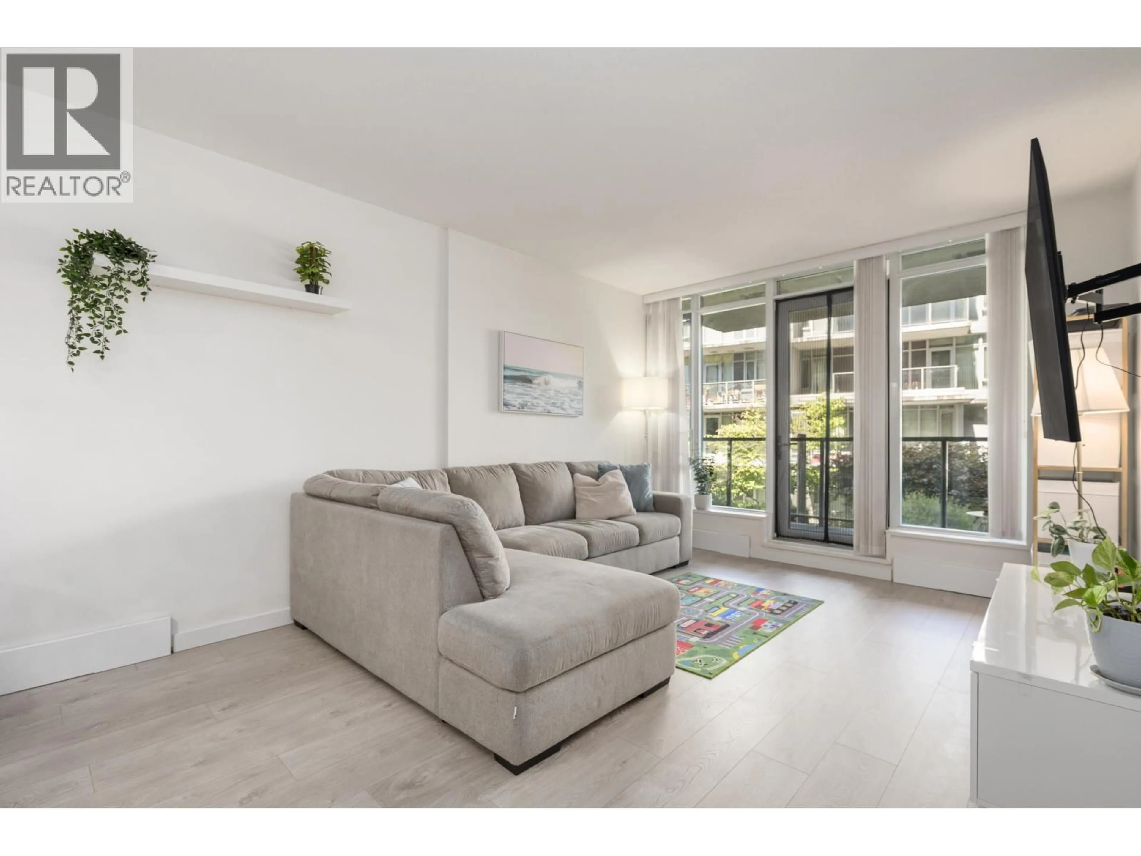 Living room with furniture, unknown for 210 - 3168 RIVERWALK AVENUE, Vancouver British Columbia V5S0B8