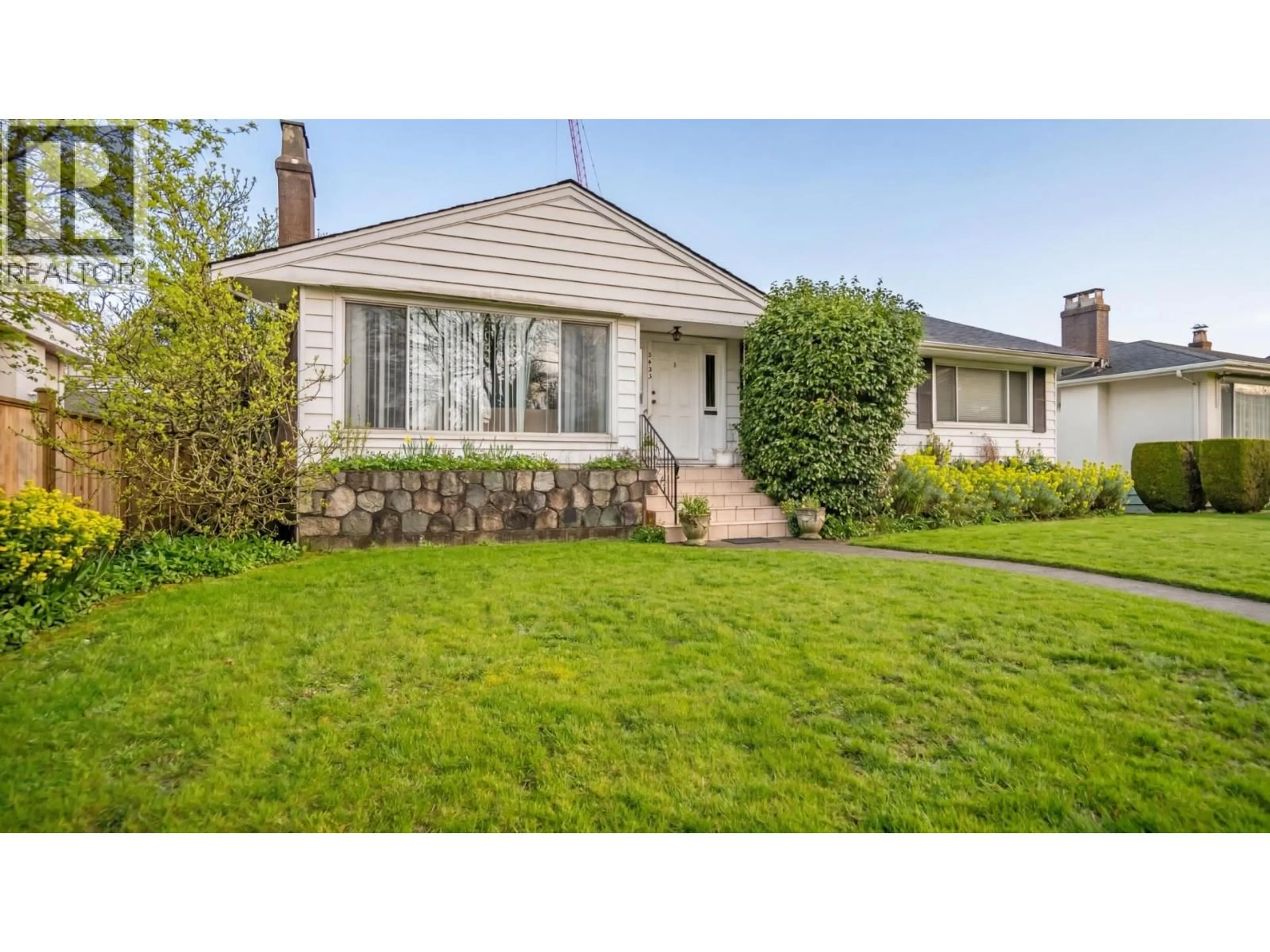 Home with vinyl exterior material, street for 5433 ASH STREET, Vancouver British Columbia V5Z3G5