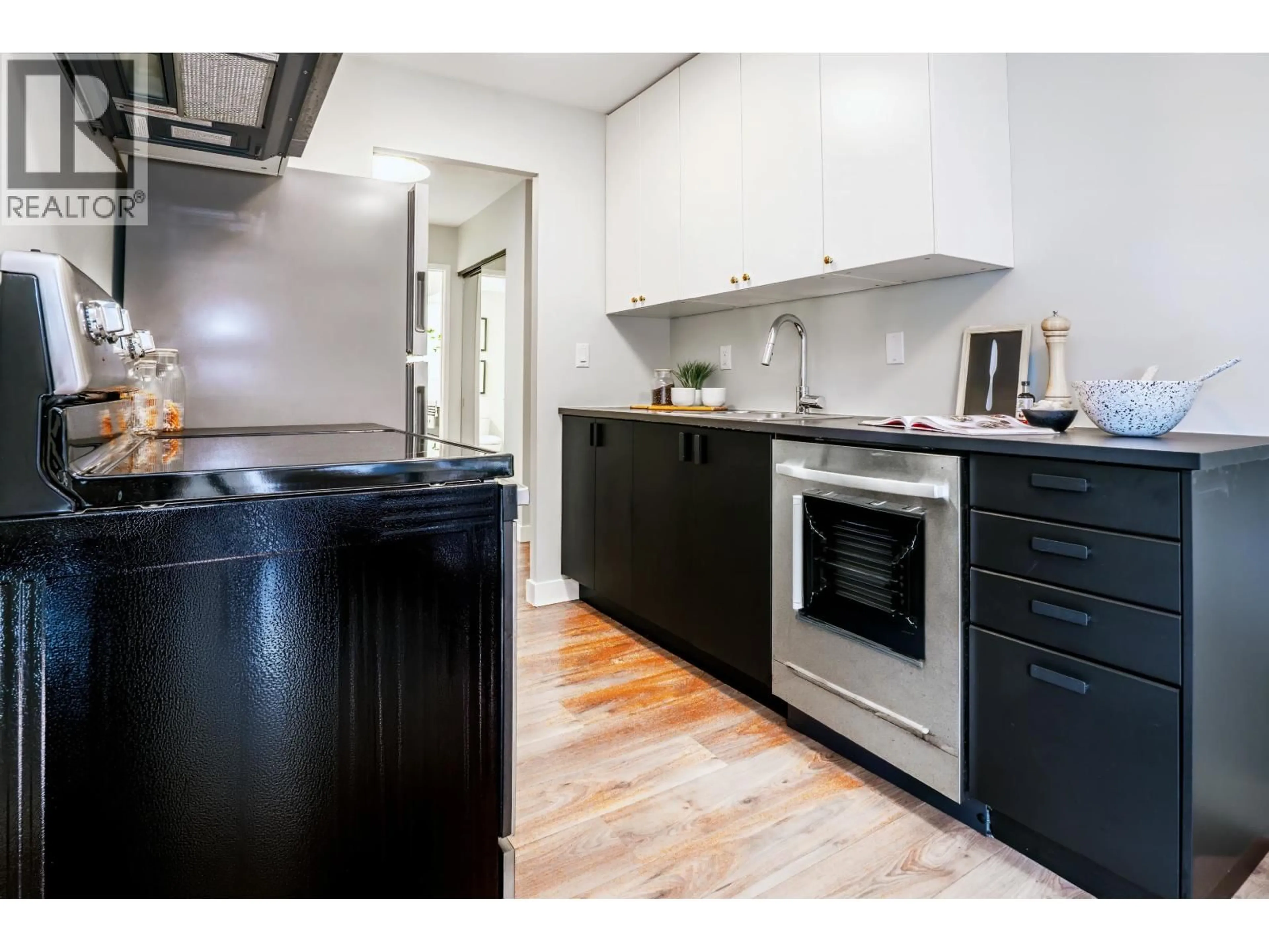 Standard kitchen, wood/laminate floor for 203 - 2240 WALL STREET, Vancouver British Columbia V5L1B6