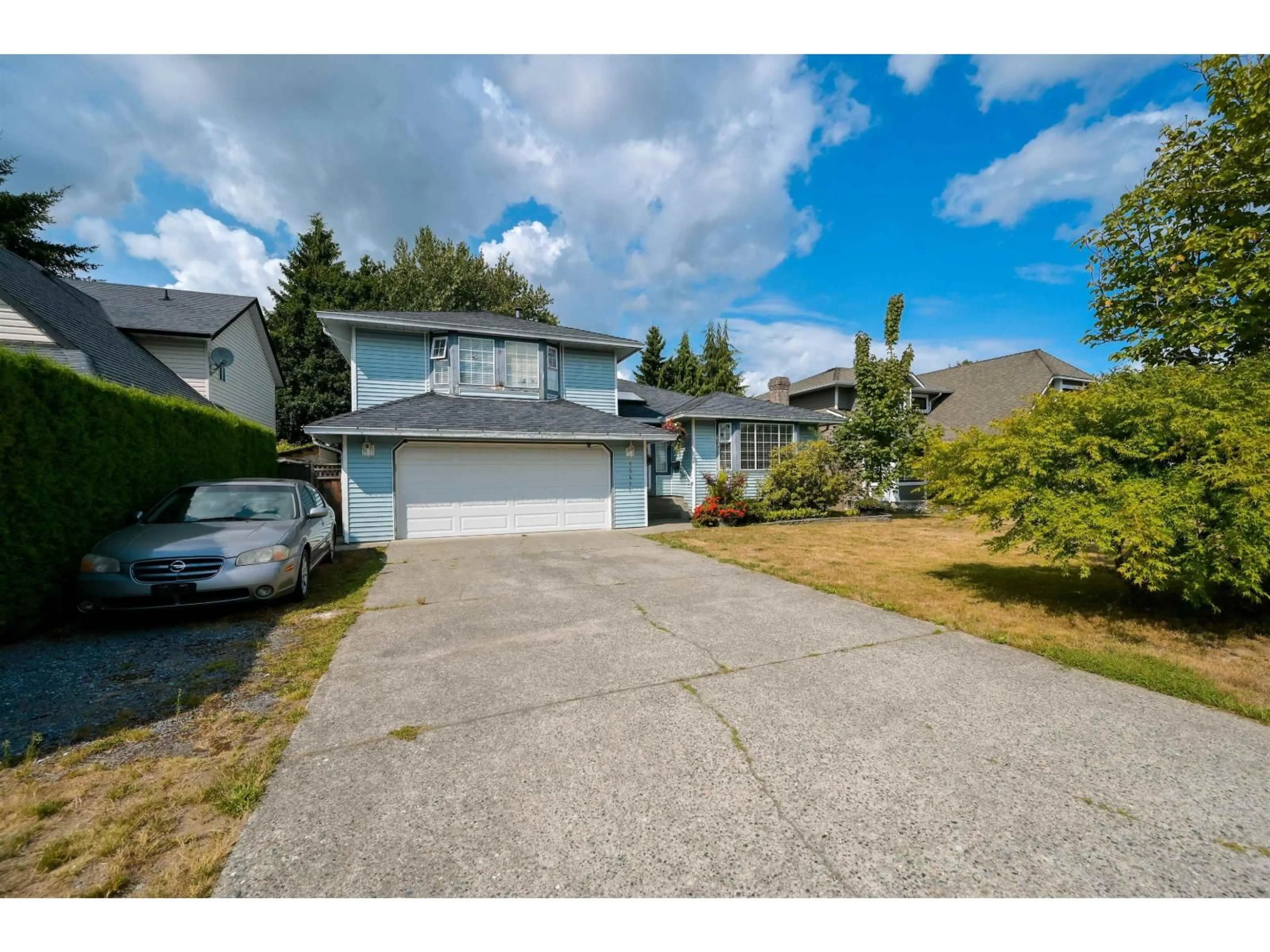 A pic from outside/outdoor area/front of a property/back of a property/a pic from drone, street for 15477 93A AVENUE, Surrey British Columbia V3R9P9