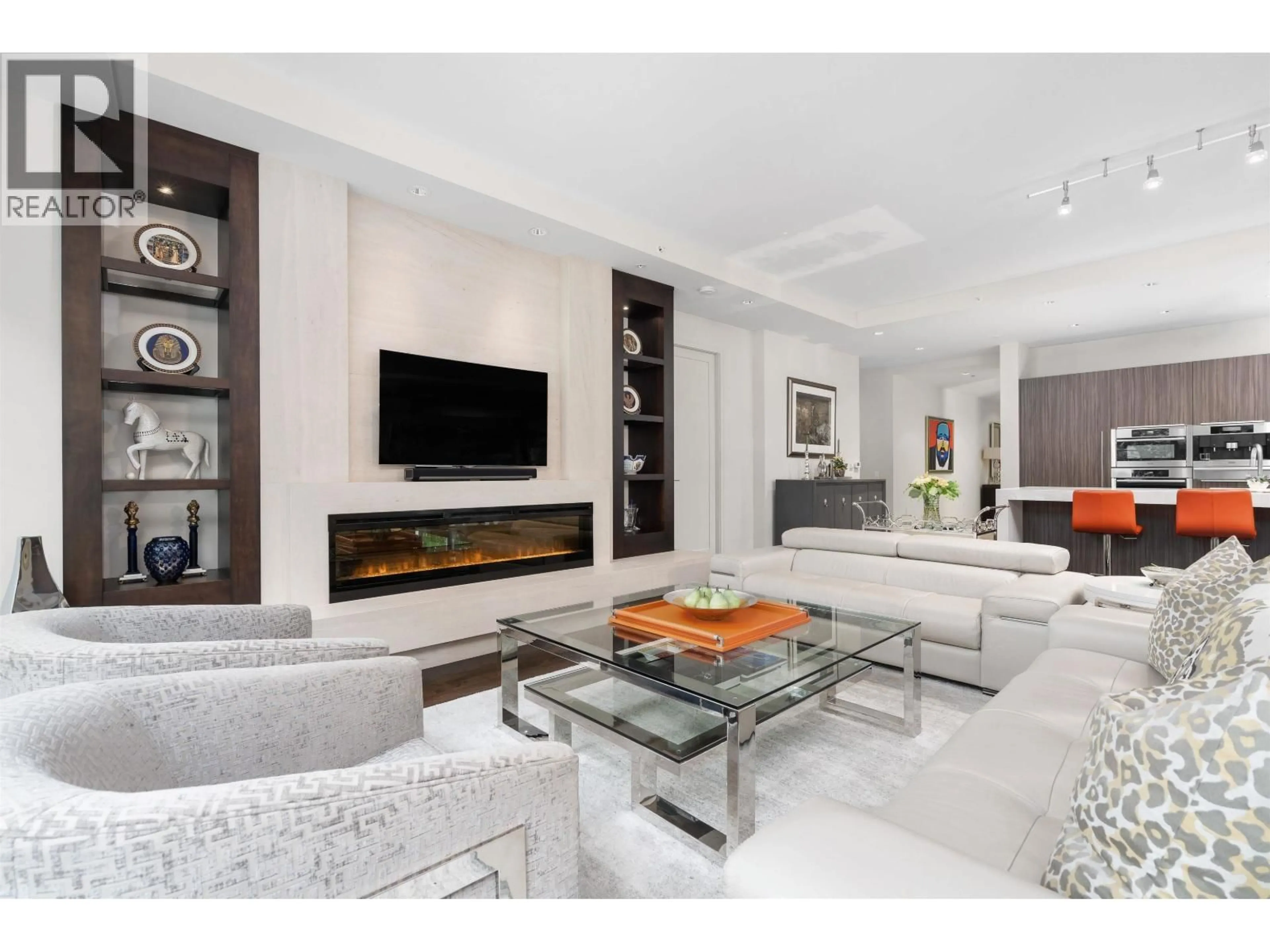 Living room with furniture, unknown for 202 - 181 ATHLETES WAY, Vancouver British Columbia V5Y0B5