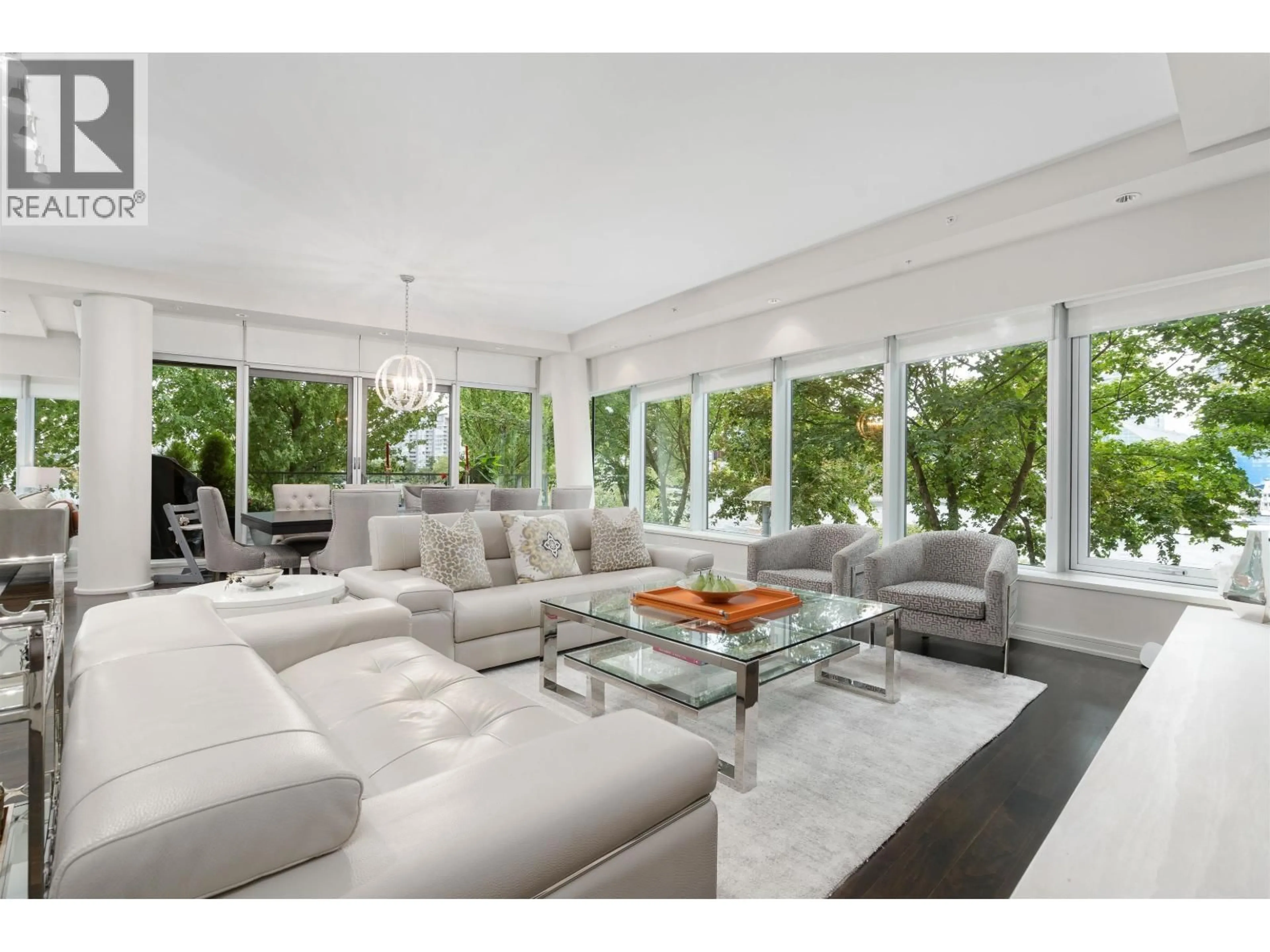 Living room with furniture, unknown for 202 - 181 ATHLETES WAY, Vancouver British Columbia V5Y0B5