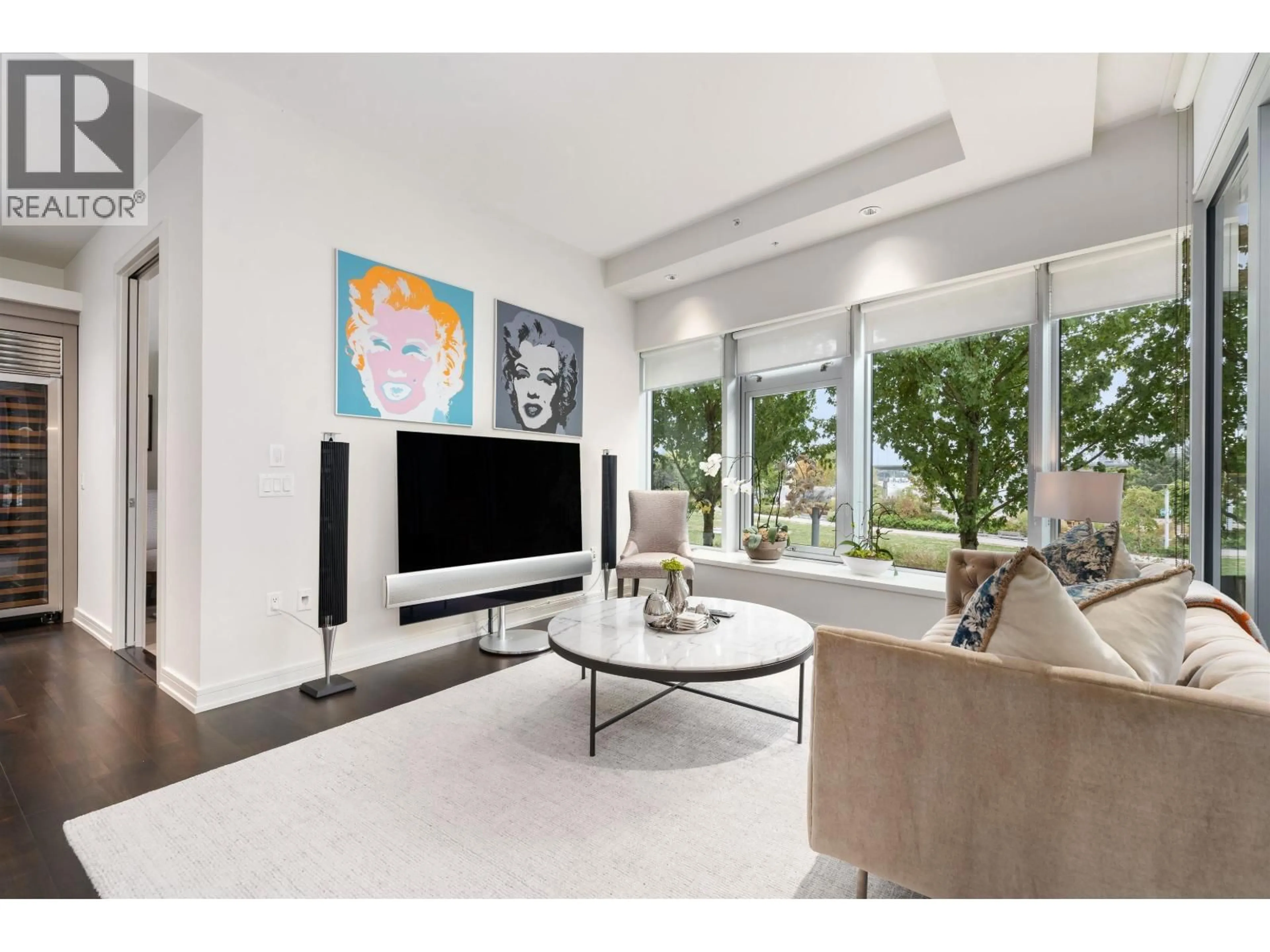 Living room with furniture, unknown for 202 - 181 ATHLETES WAY, Vancouver British Columbia V5Y0B5