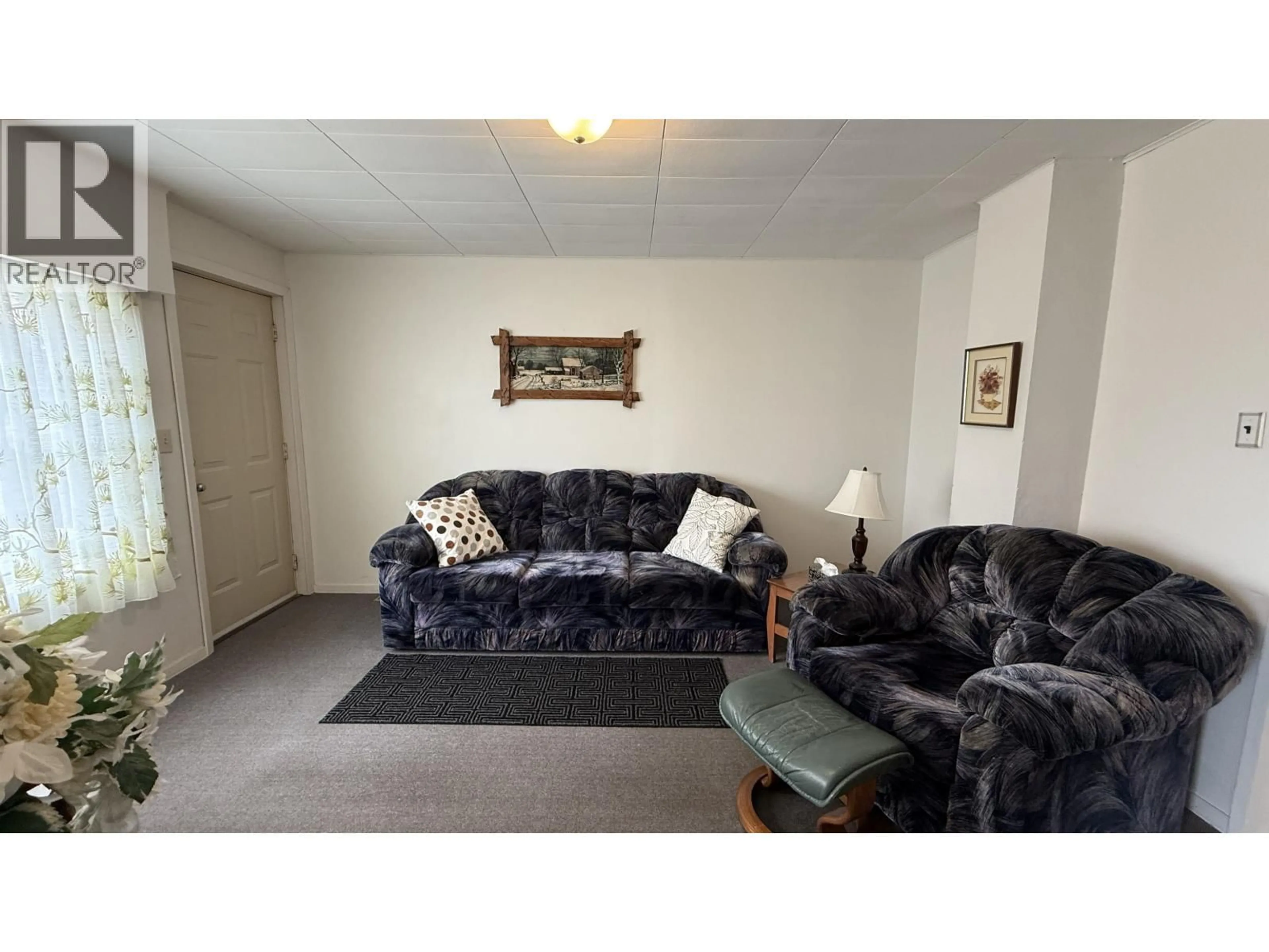 Living room with furniture, carpet floor for 848 SCOTT ROAD, 100 Mile House British Columbia V0K2E0