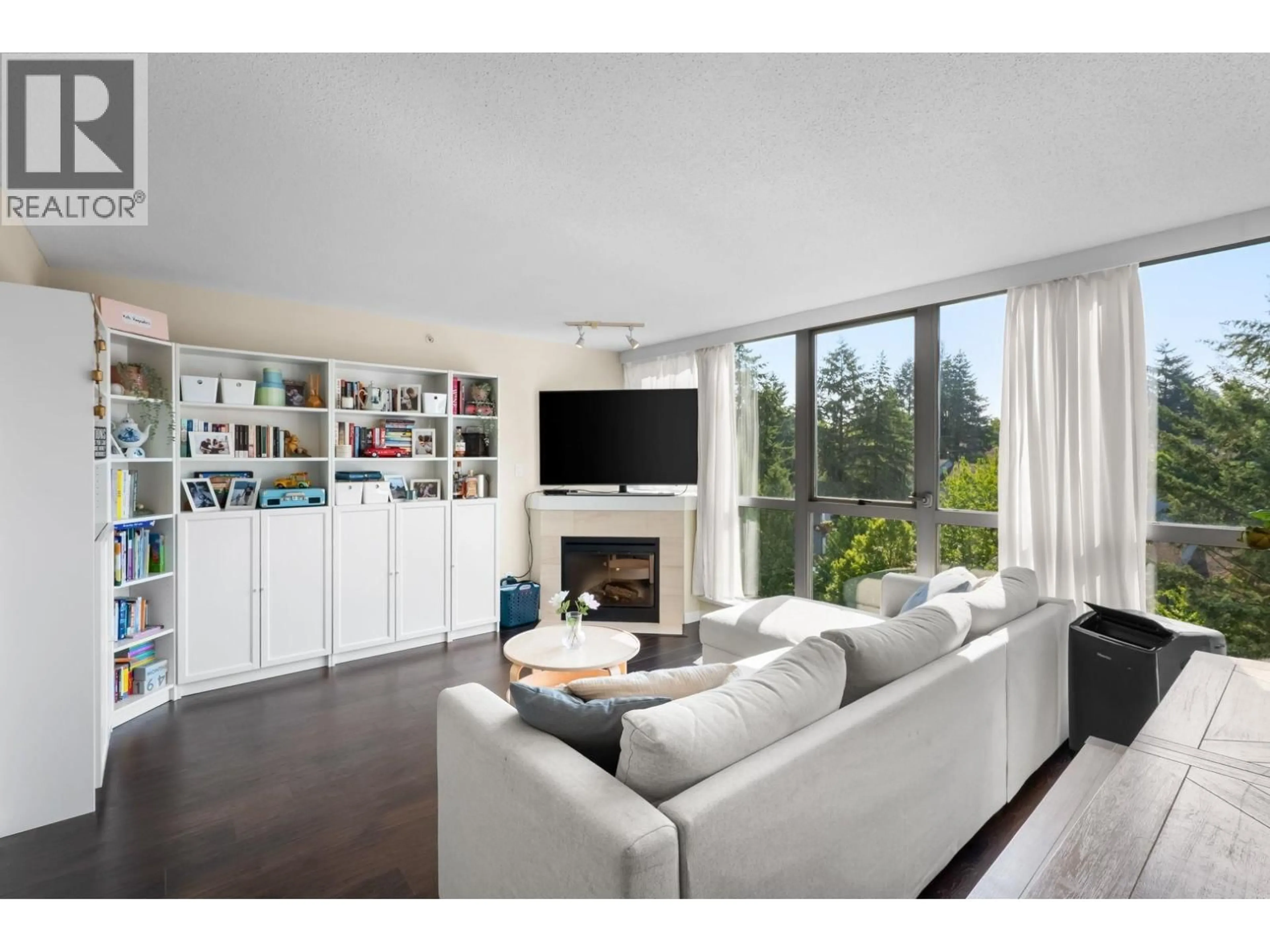 Living room with furniture, unknown for 902 - 295 GUILDFORD WAY, Port Moody British Columbia V3H5N3