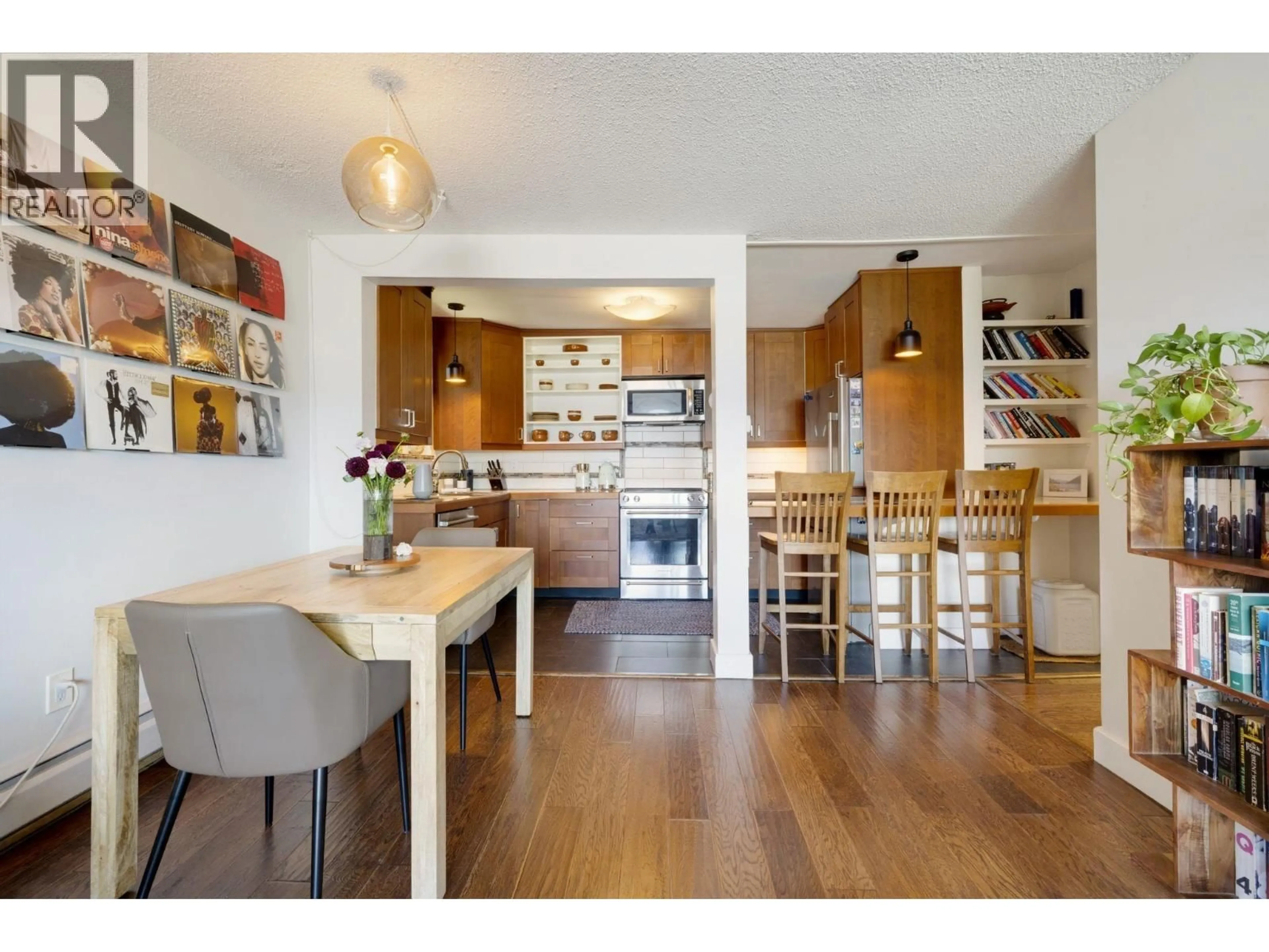 Open concept kitchen, wood/laminate floor for 302 - 391 7TH AVENUE, Vancouver British Columbia V5T4H1