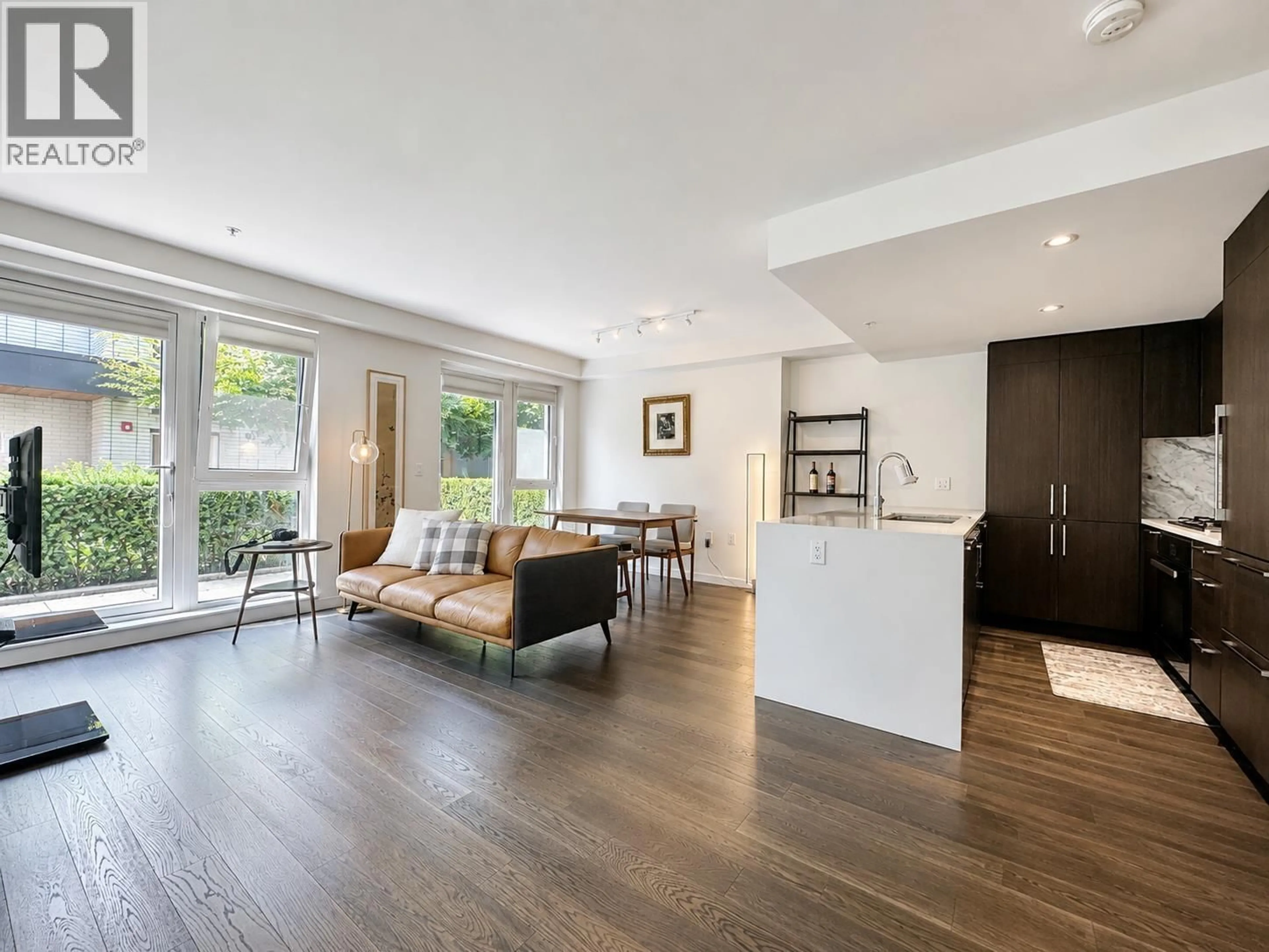 Open concept kitchen, wood/laminate floor for 104 - 5383 CAMBIE STREET, Vancouver British Columbia V5Z2Z9