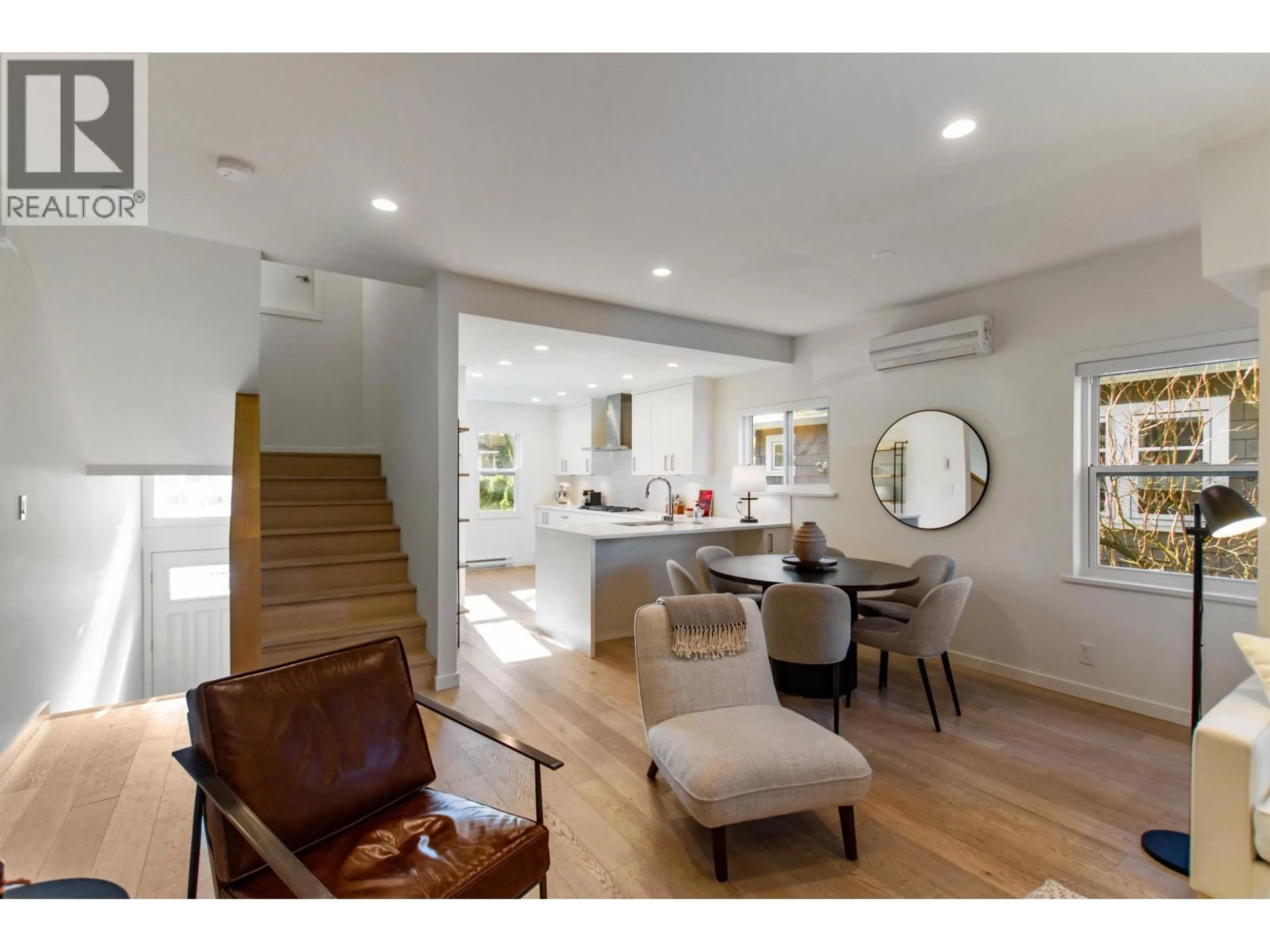 Open concept kitchen, wood/laminate floor for 1829 13TH AVENUE, Vancouver British Columbia V6J2H4