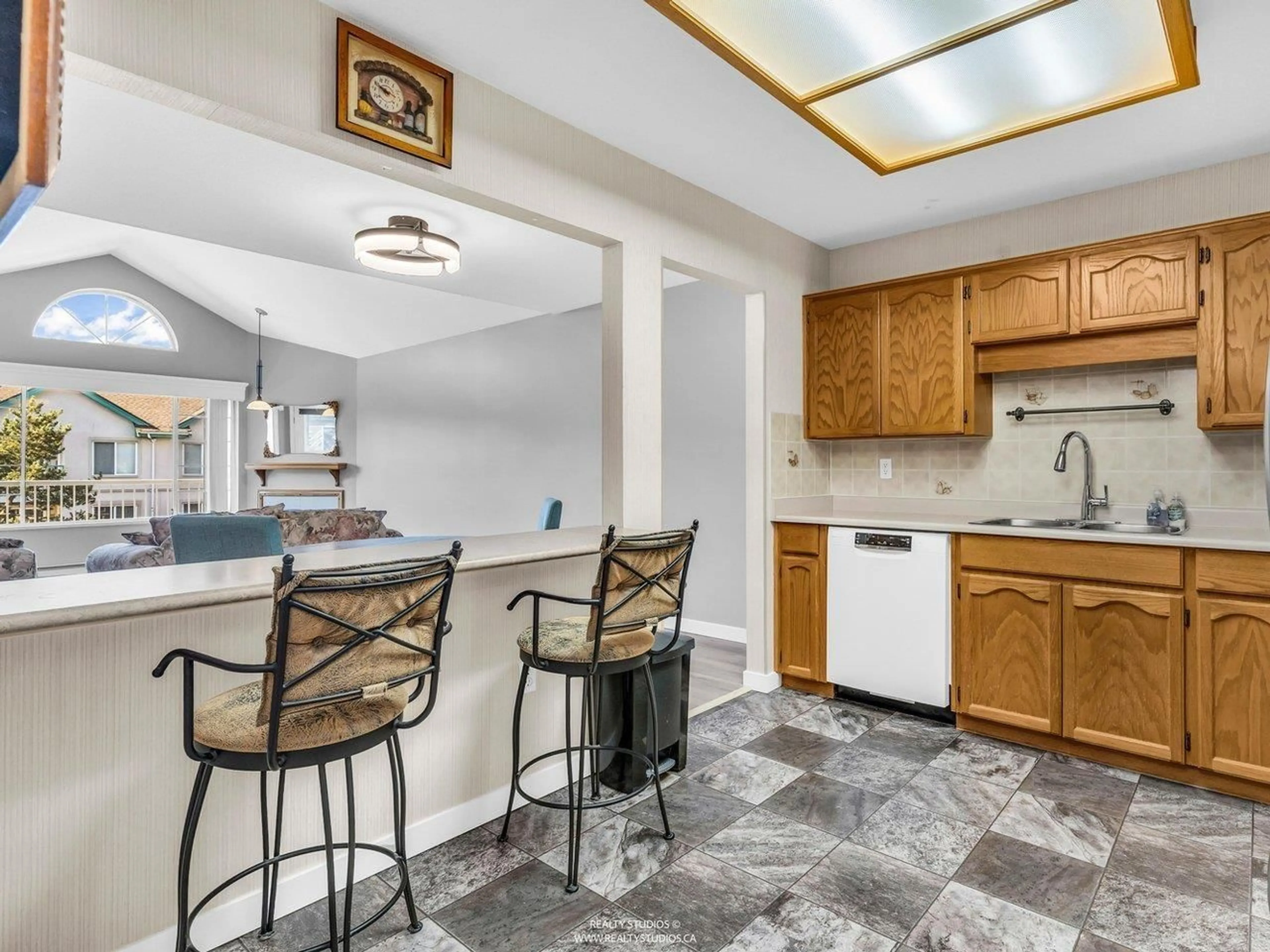 Open concept kitchen, ceramic/tile floor for 312 - 5375 205 STREET, Langley British Columbia V3A7V7