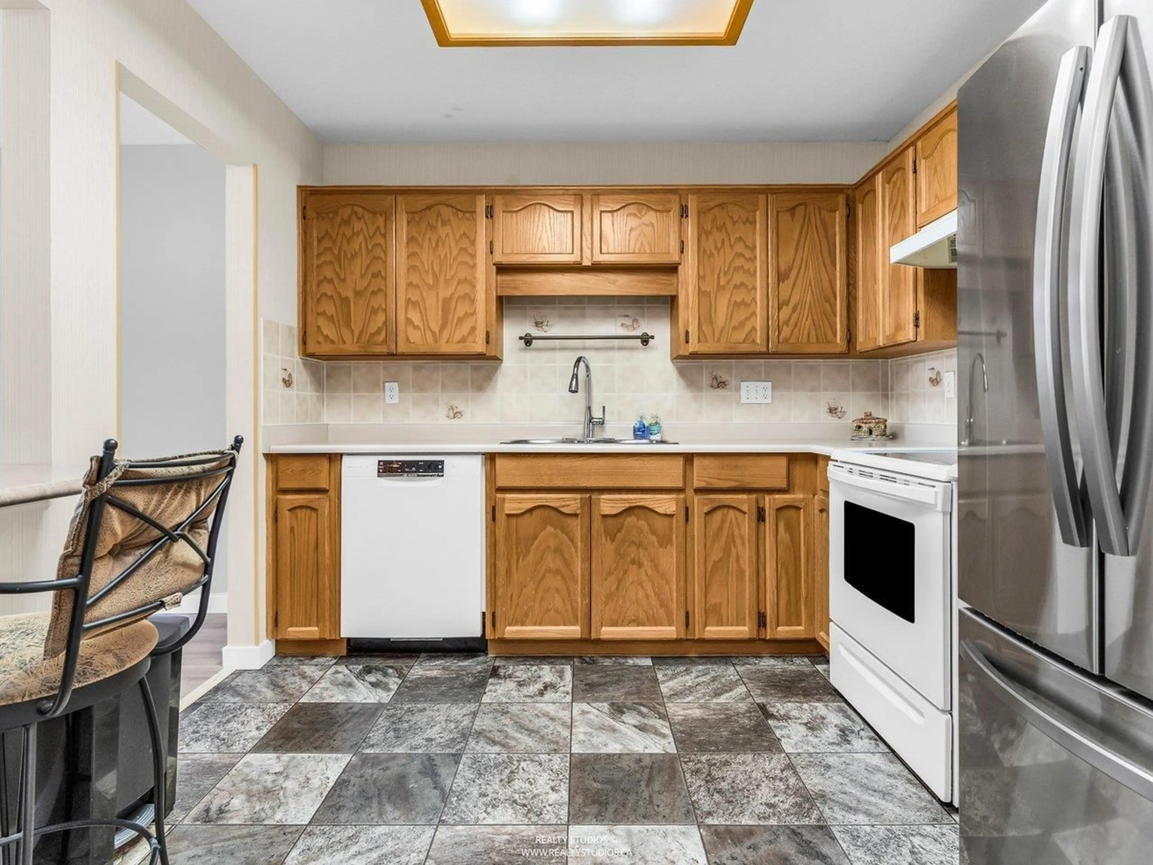 Standard kitchen, ceramic/tile floor for 312 - 5375 205 STREET, Langley British Columbia V3A7V7